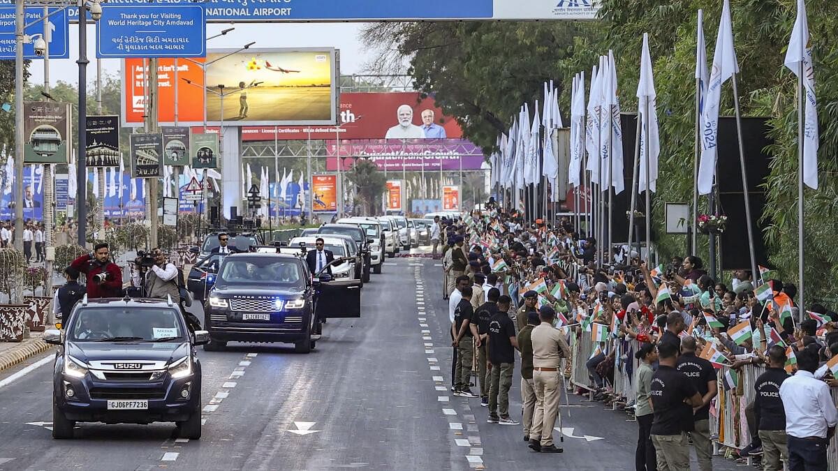 <div class="paragraphs"><p>A group of people cheer as Prime Minister Narendra Modi with UAE President Mohamed bin Zayed Al Nahyan, unseen, passes by during a roadshow, in Ahmedabad, Tuesday, Jan. 9, 2024.</p></div>