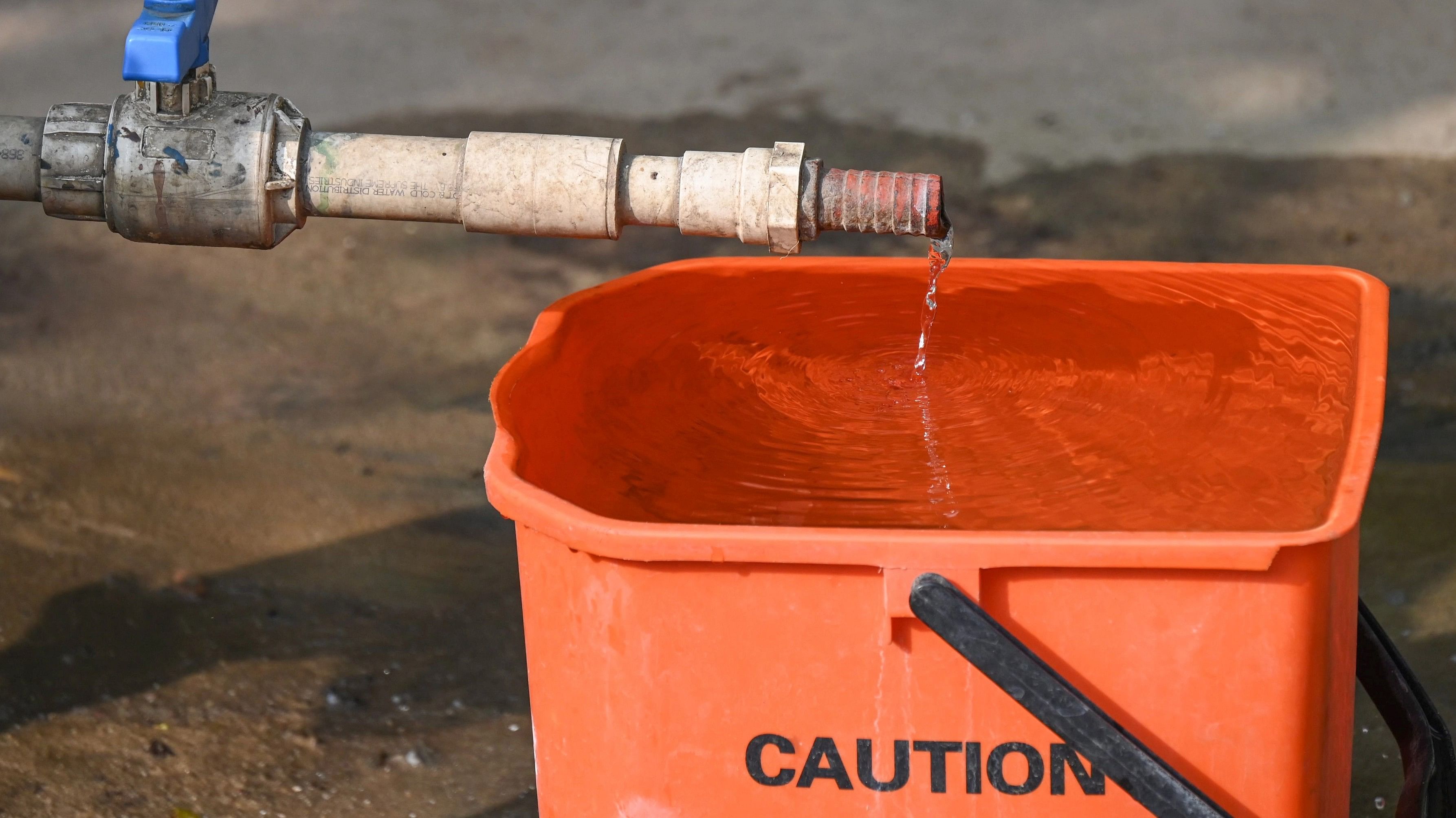 <div class="paragraphs"><p>Water dripping from a closed tap. </p></div>