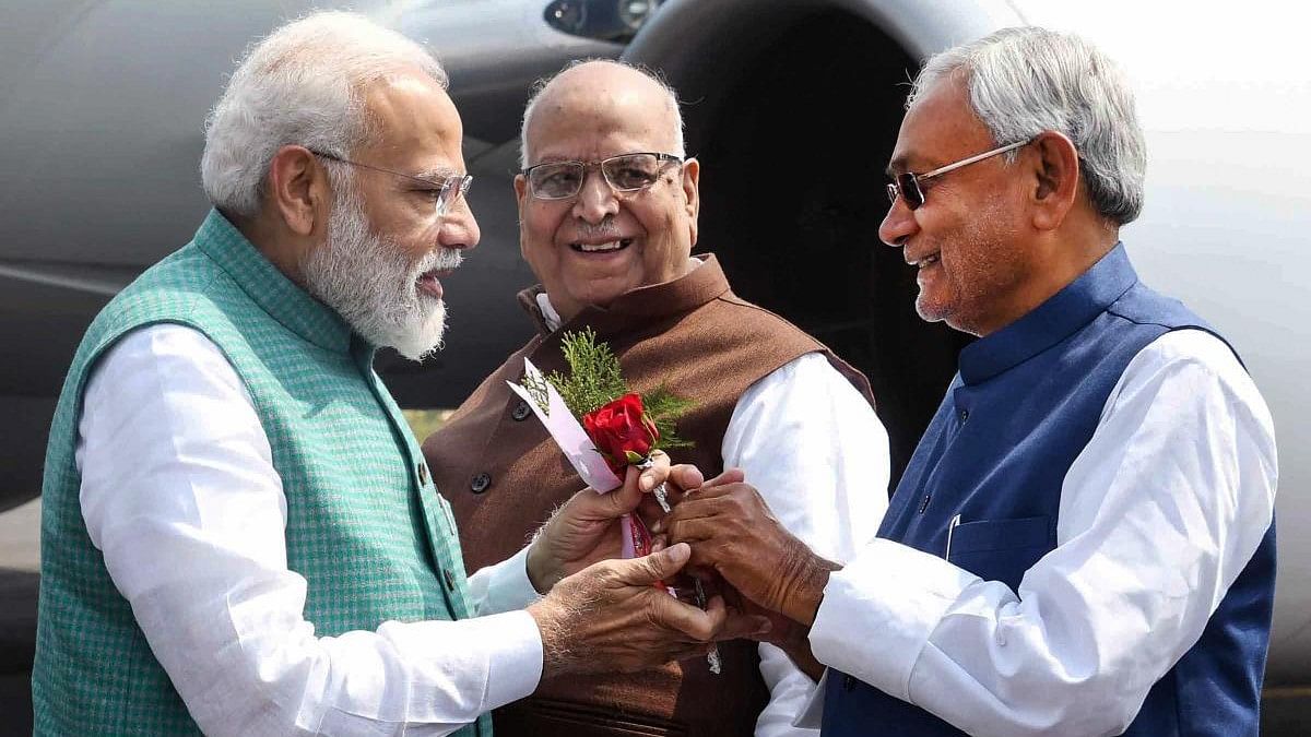 <div class="paragraphs"><p>Nitish Kumar with Narendra Modi.</p></div>