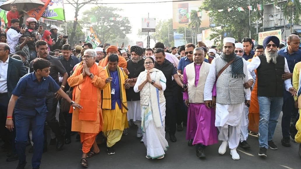 <div class="paragraphs"><p>Mamata Banerjee greets crowd during the Sanhati Rally.</p></div>