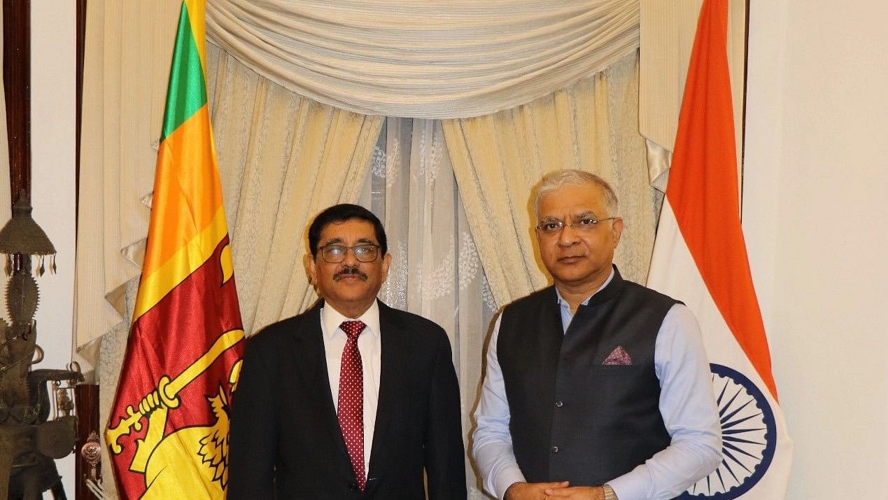 <div class="paragraphs"><p>High Commissioner of India Santosh Jha with the Governor of the Central Bank of Sri Lanka (CBSL), Dr Nandalal Weerasinghe.</p></div>