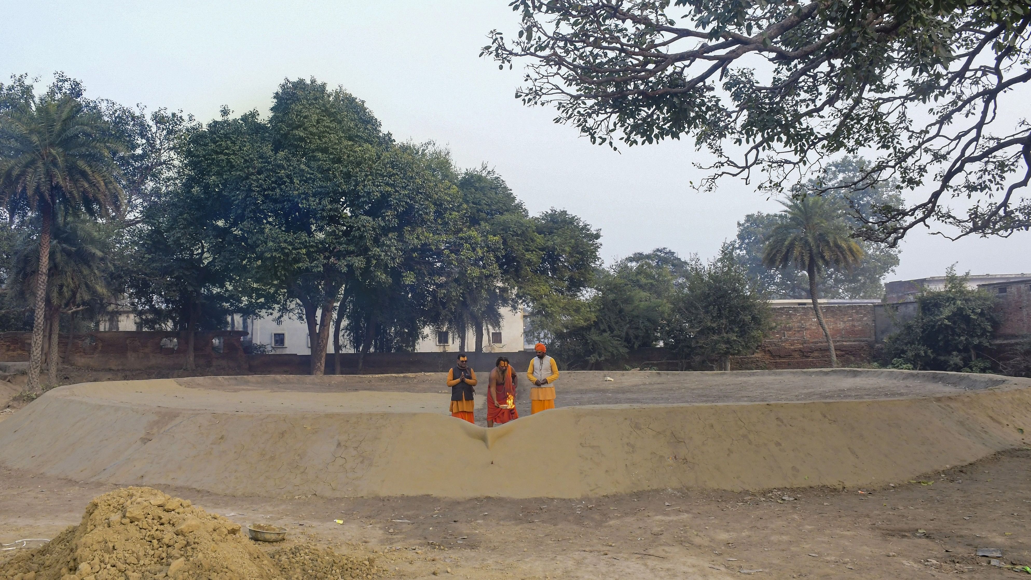 <div class="paragraphs"><p>Priests perform rituals before a 300-foot 'diya', which will be lit ahead of the consecration ceremony in Ayodhya.</p></div>