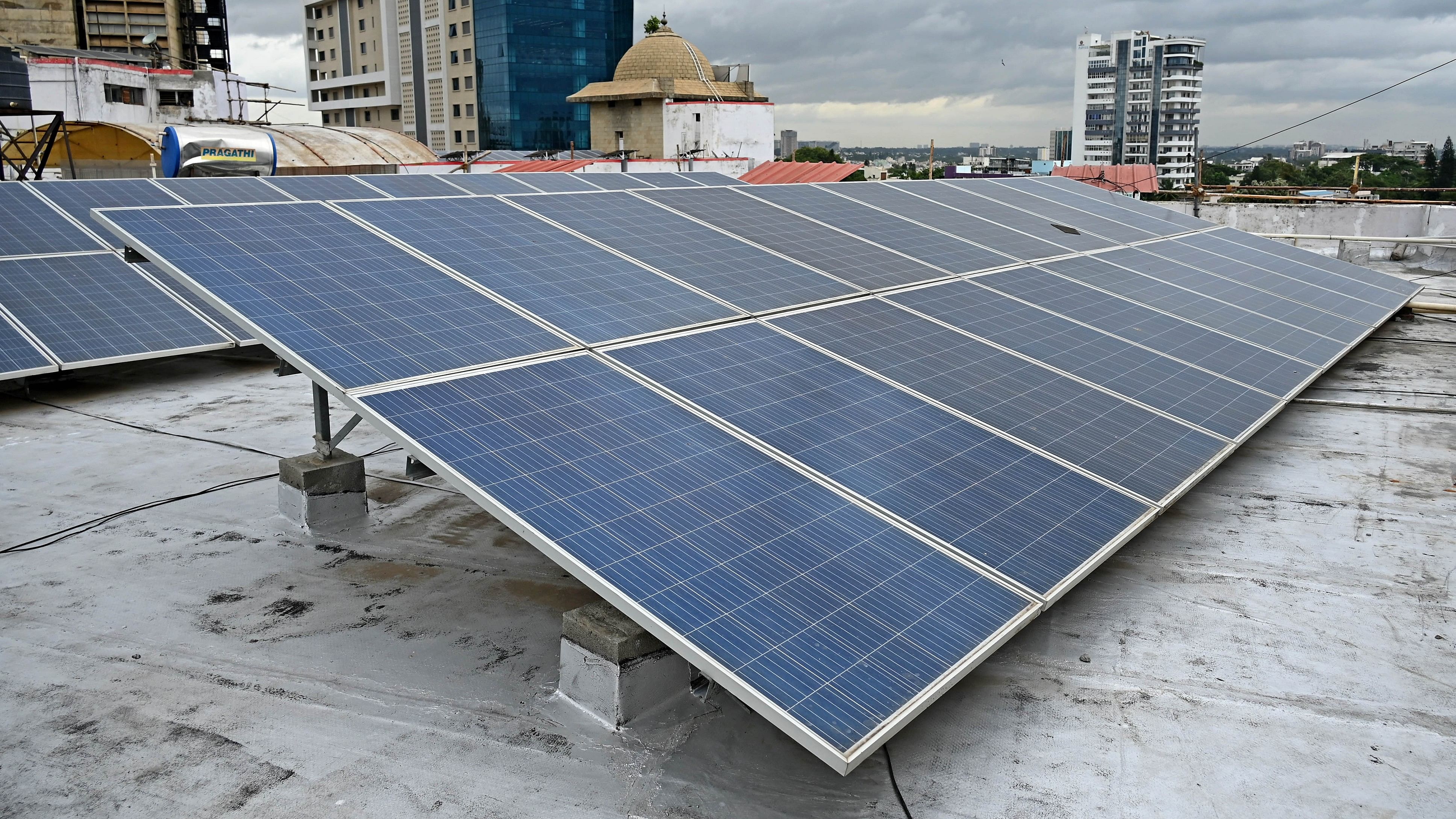 <div class="paragraphs"><p>Rooftop solar panels atop a building in Bengaluru. </p></div>