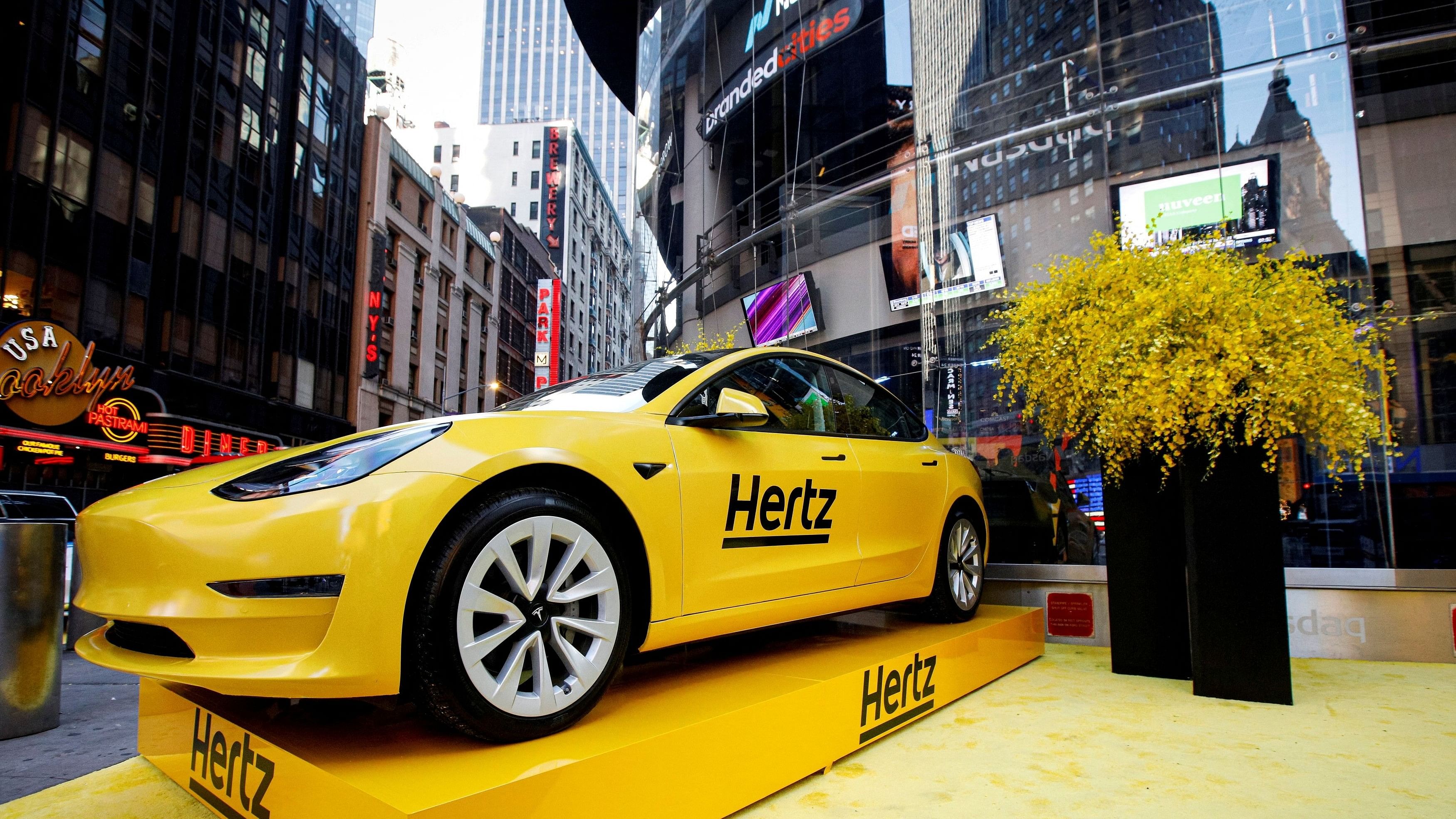 <div class="paragraphs"><p>A Hertz Tesla electric vehicle is displayed during the Hertz Corporation IPO at the Nasdaq Market site in Times Square in New York City, US.</p></div>