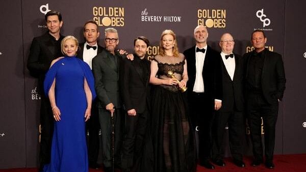 <div class="paragraphs"><p>Jesse Armstrong, Matthew Macfadyen, Sarah Snook, Kieran Kulkin, J. Smith Cameron, Alan Ruck, and Nicholas Braun pose with the award for Best Television Series - Drama, for "Succession" at the 81st Annual Golden Globe Awards</p></div>