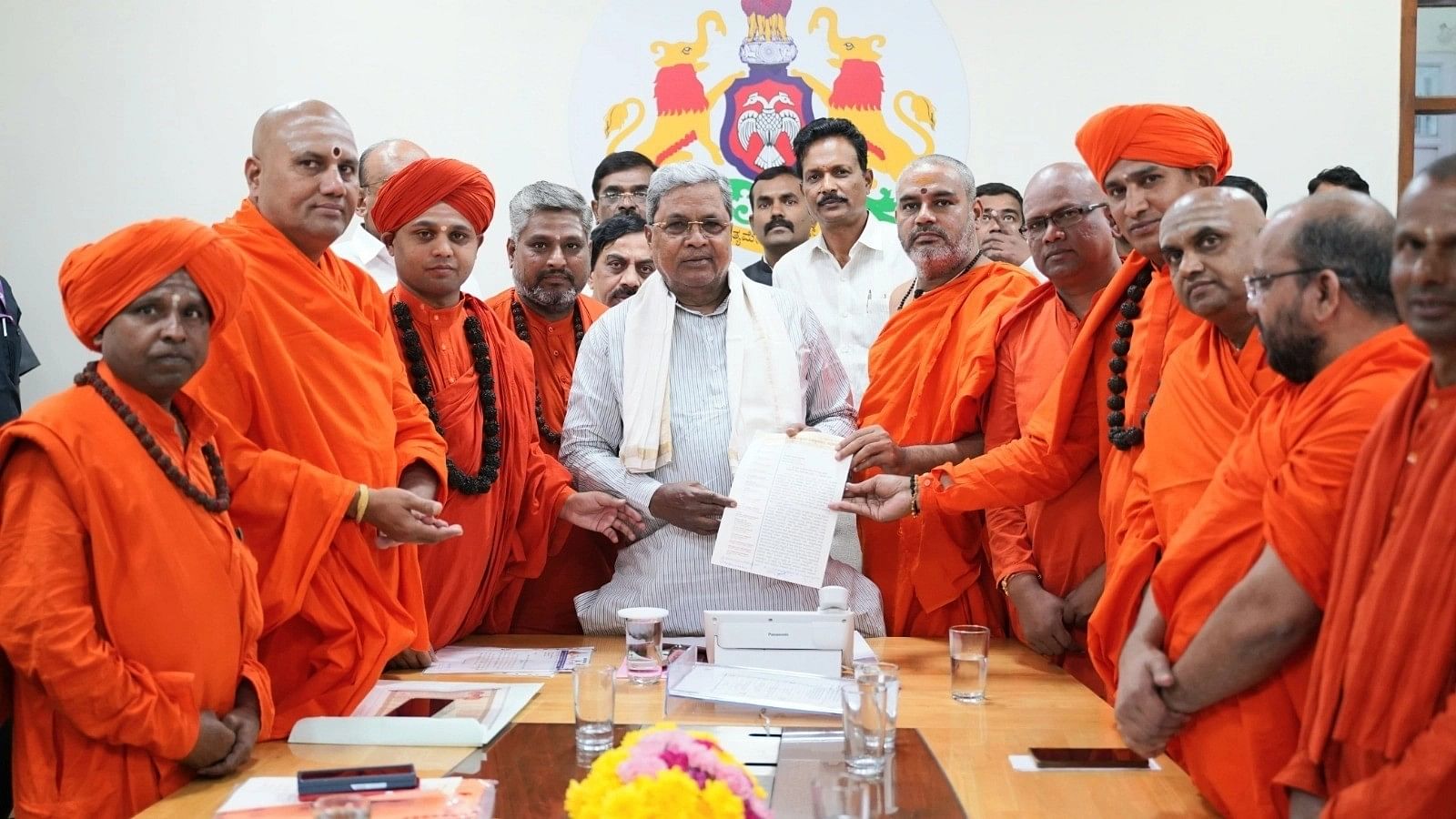 <div class="paragraphs"><p>Pontiffs representing backward and Dalit mutts with Karnataka Chief Minister Siddaramaiah.</p></div>