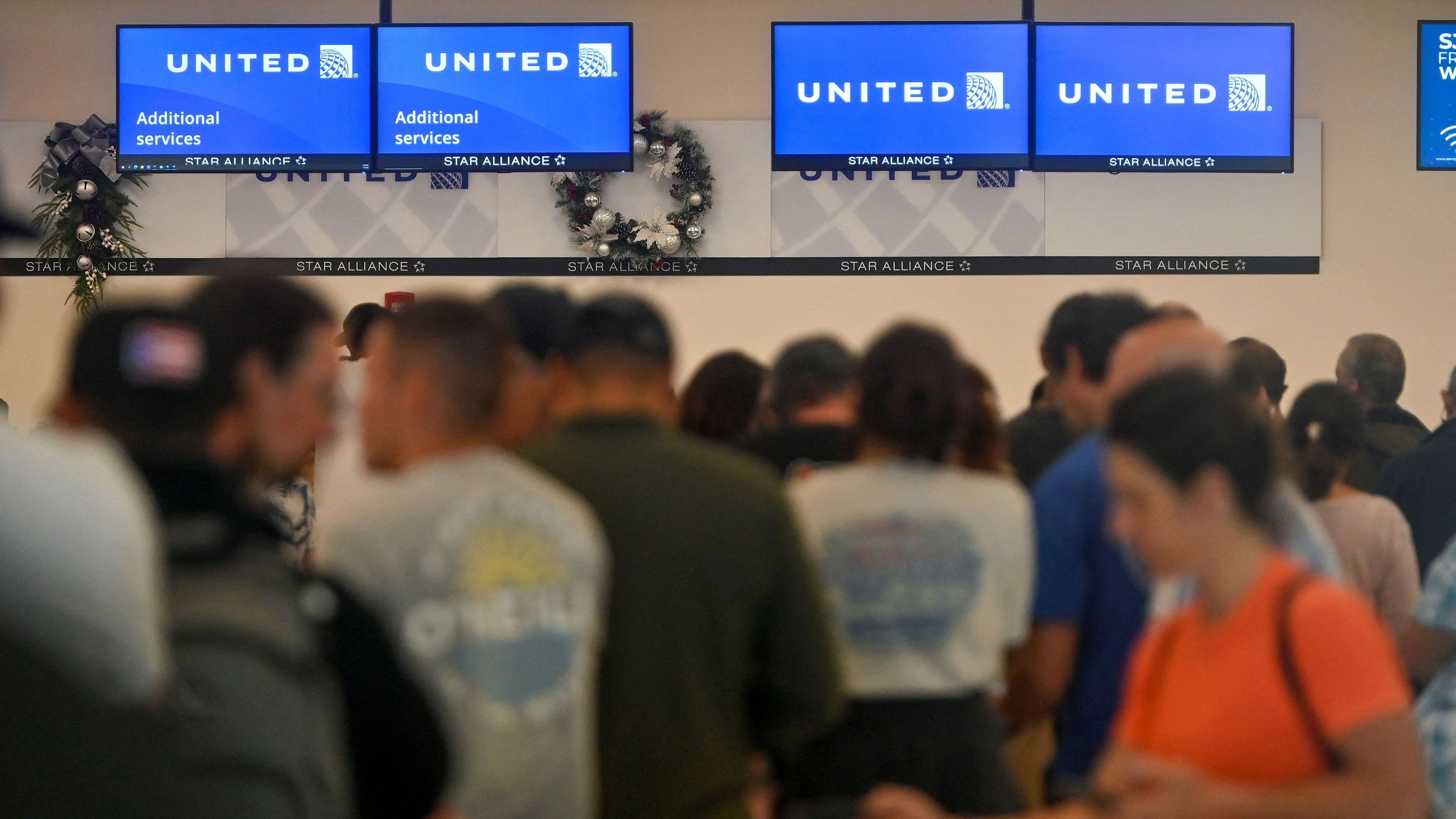 <div class="paragraphs"><p>Passengers try to rebook their tickets from cancelled United Airlines flights after US air safety regulator the Federal Aviation Administration  grounded 171 Boeing 737 MAX 9 jetliners for safety checks because of the emergency landing of an Alaska Airlines plane, at Luis Munoz Marin International Airport in San Juan, Puerto Rico January 7, 2024. </p></div>