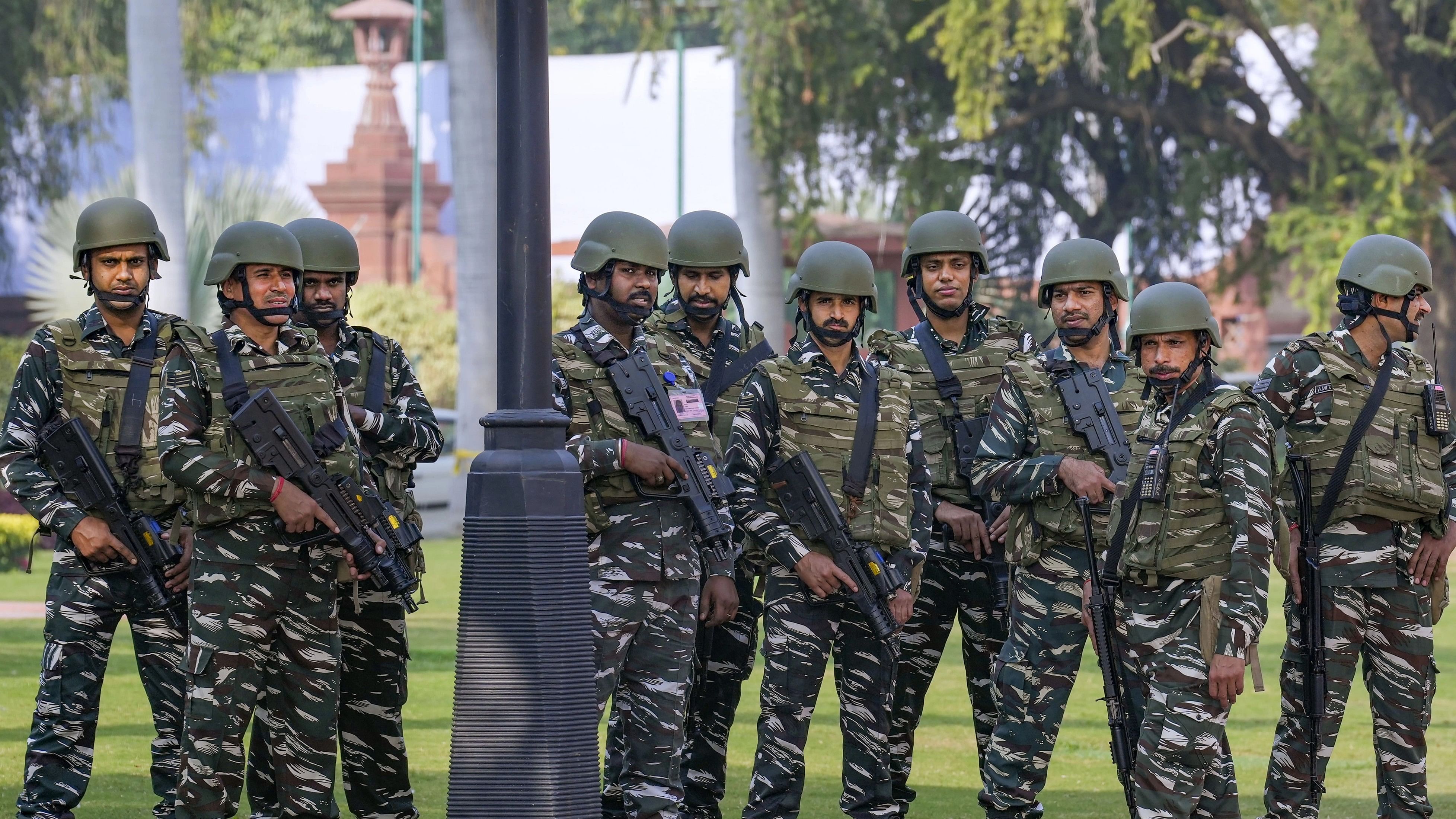 <div class="paragraphs"><p>Security personnel outside the Parliament House during the Winter session, in New Delhi, Wednesday, Dec 13, 2023. </p></div>