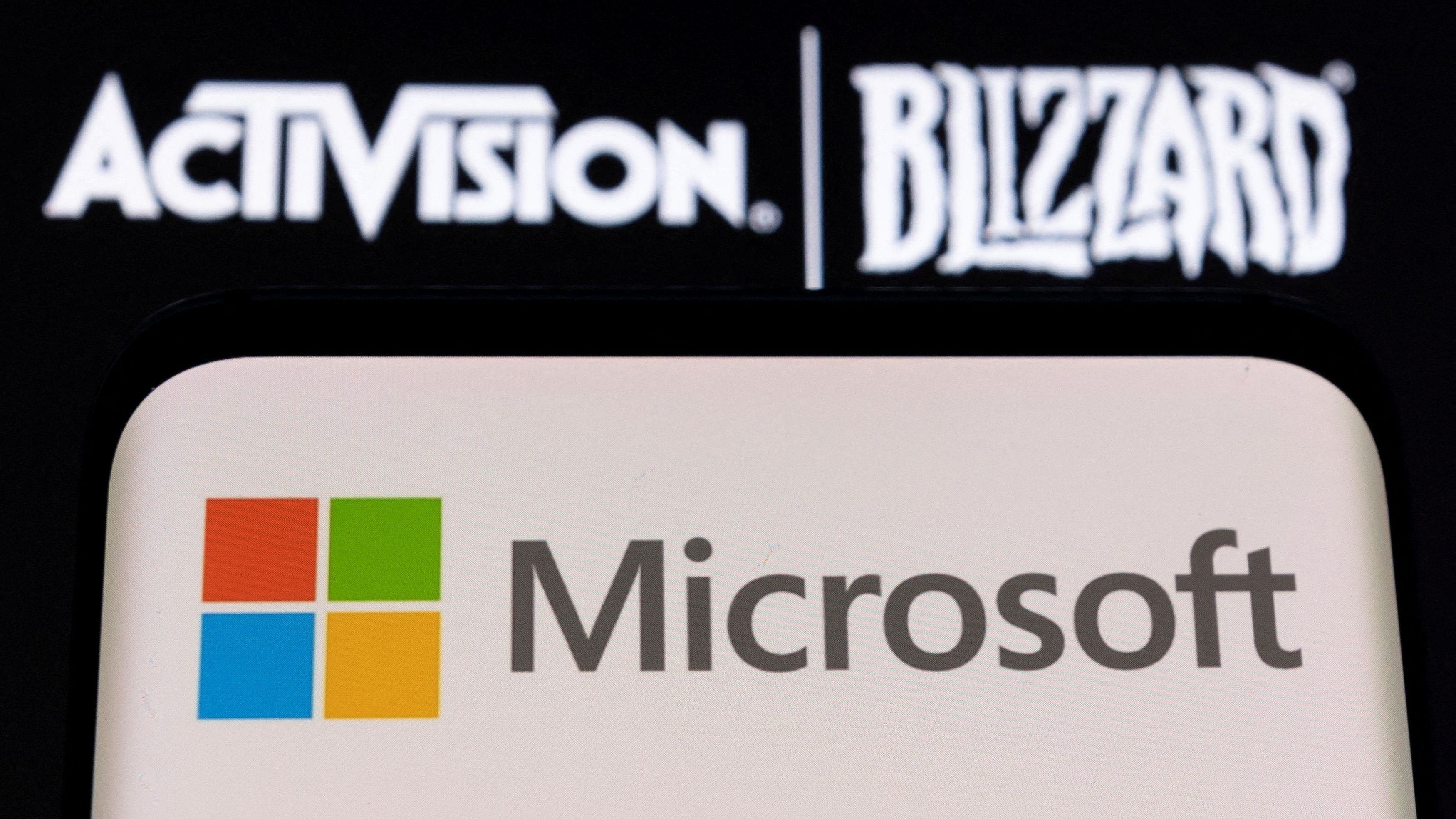 <div class="paragraphs"><p>FILE PHOTO: Microsoft logo is seen on a smartphone placed on displayed Activision Blizzard logo in this illustration.</p></div>