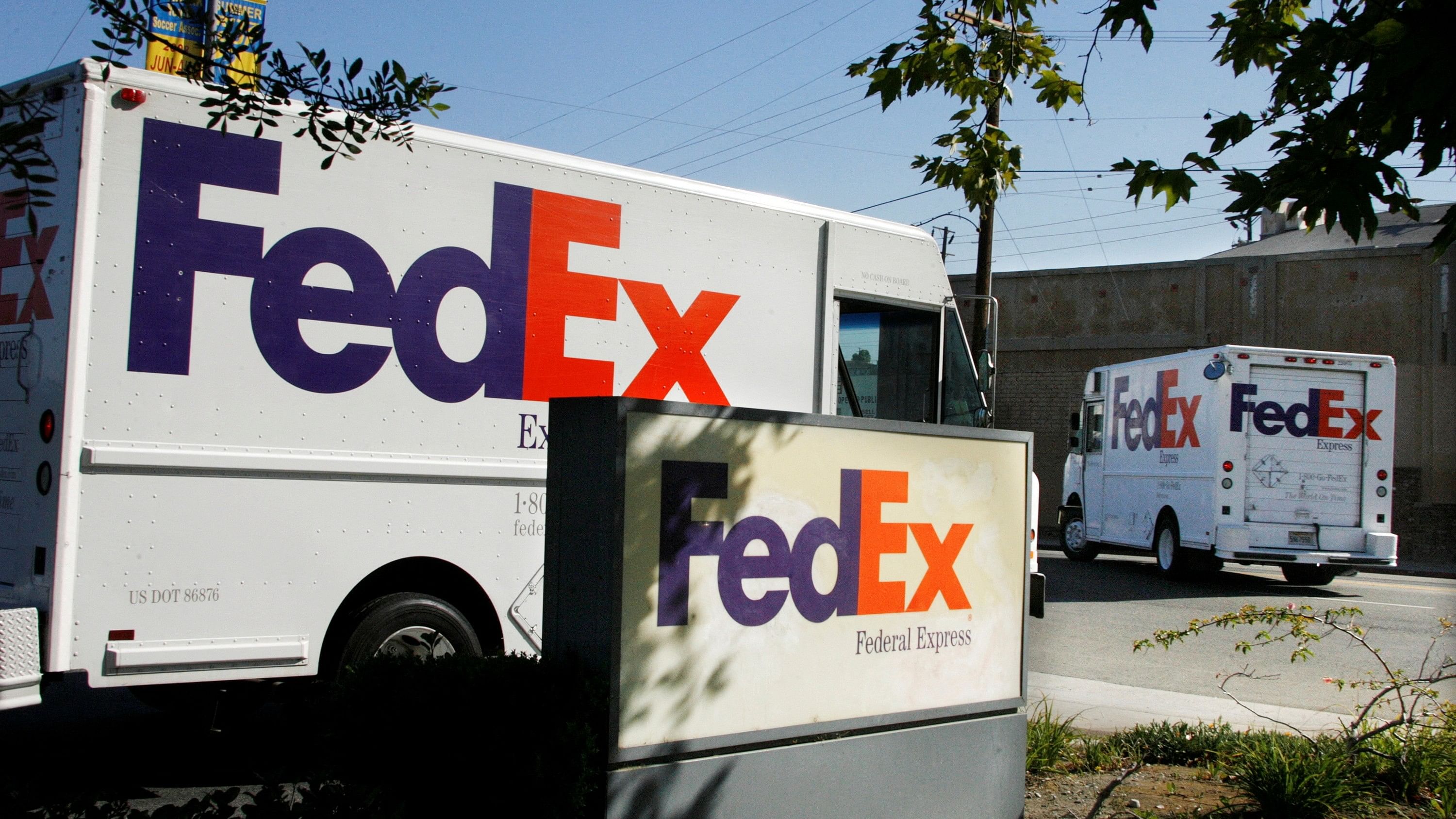 <div class="paragraphs"><p>Federal Express trucks head out for deliveries from a FedEx station in Los Angeles.&nbsp;</p></div>