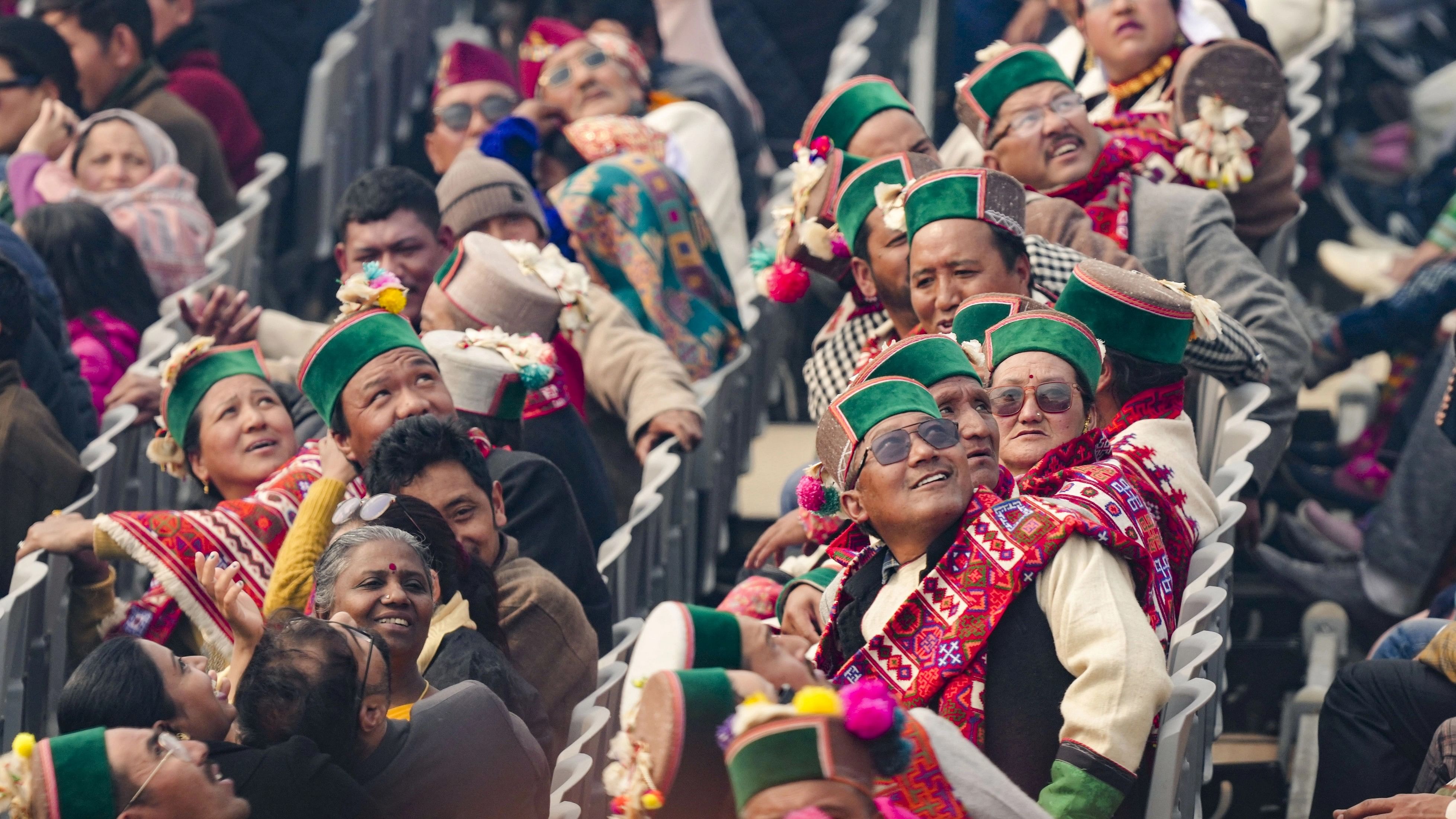 <div class="paragraphs"><p>People watch the Indian Air Force aircrafts flying past during the 75th Republic Day celebrations, at the Kartavya Path in New Delhi, Friday, January 26, 2024.</p></div>