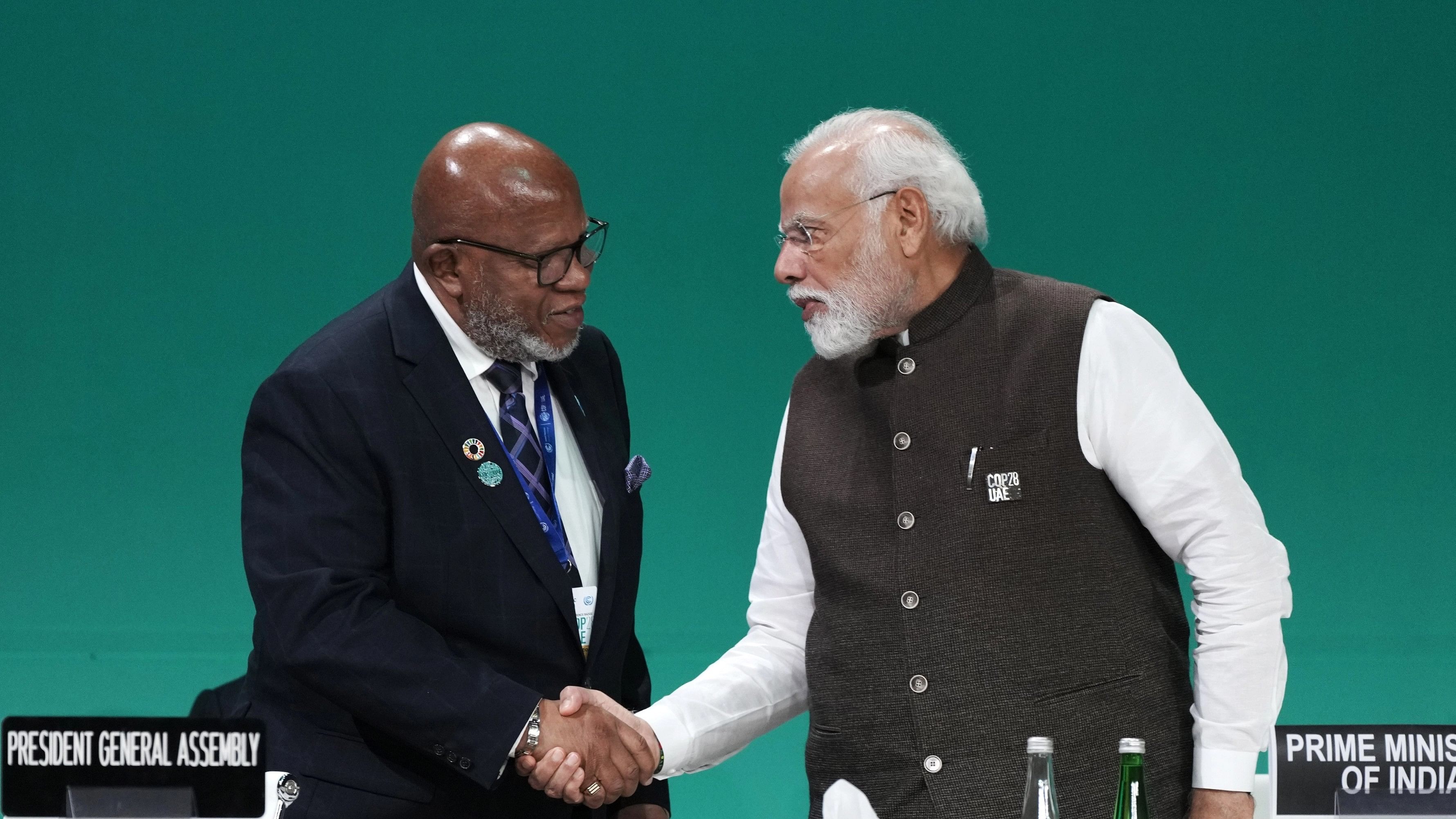 <div class="paragraphs"><p>Dennis Francis, president of the U.N. General Assembly, left, speaks with Indian Prime Minister Narendra Modi, right.</p></div>