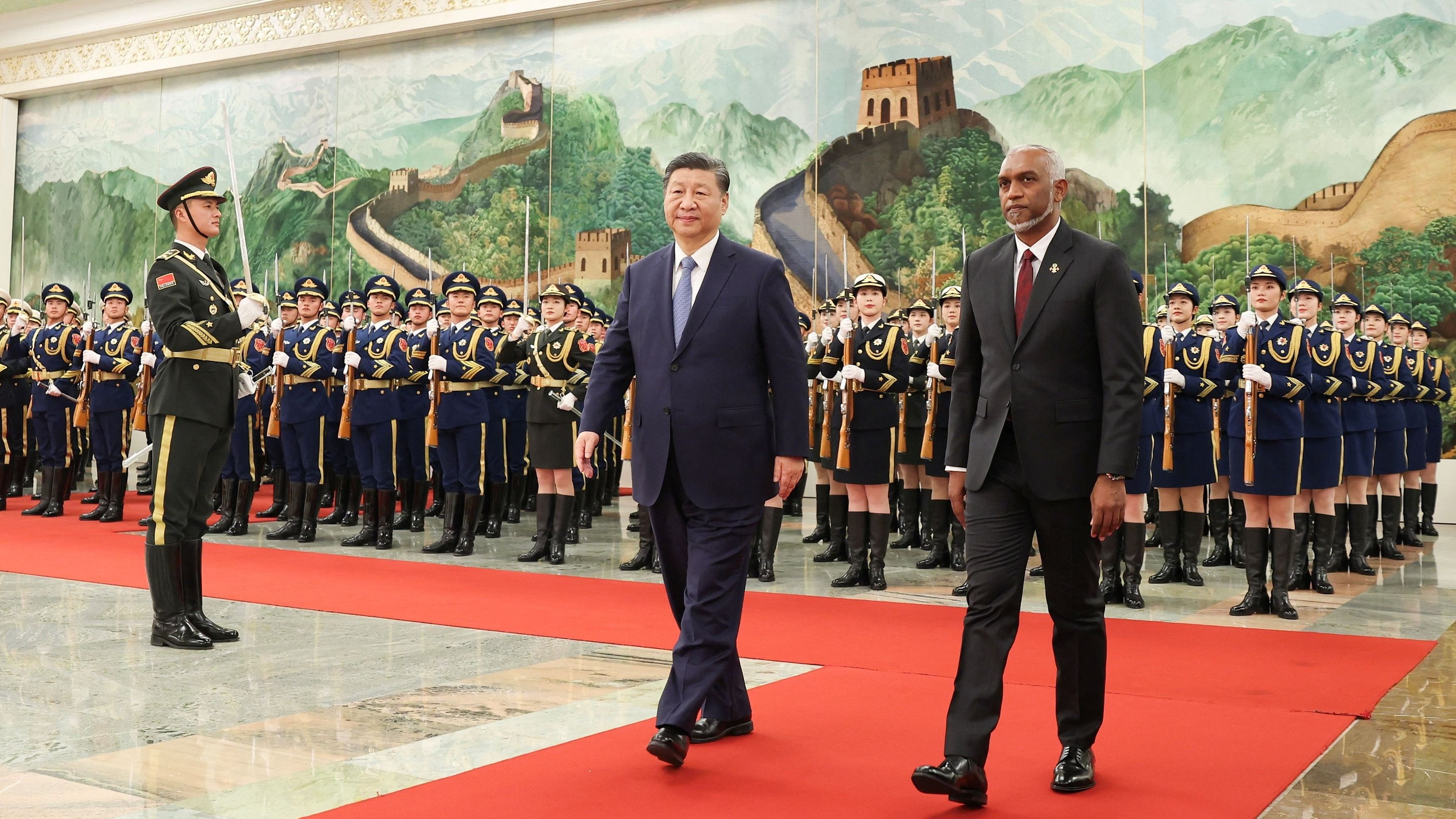 <div class="paragraphs"><p>Chinese President Xi Jinping and Maldivian President Mohamed Muizzu attend a welcome ceremony at the Great Hall of the People in Beijing, China January 10, 2024.  </p></div>