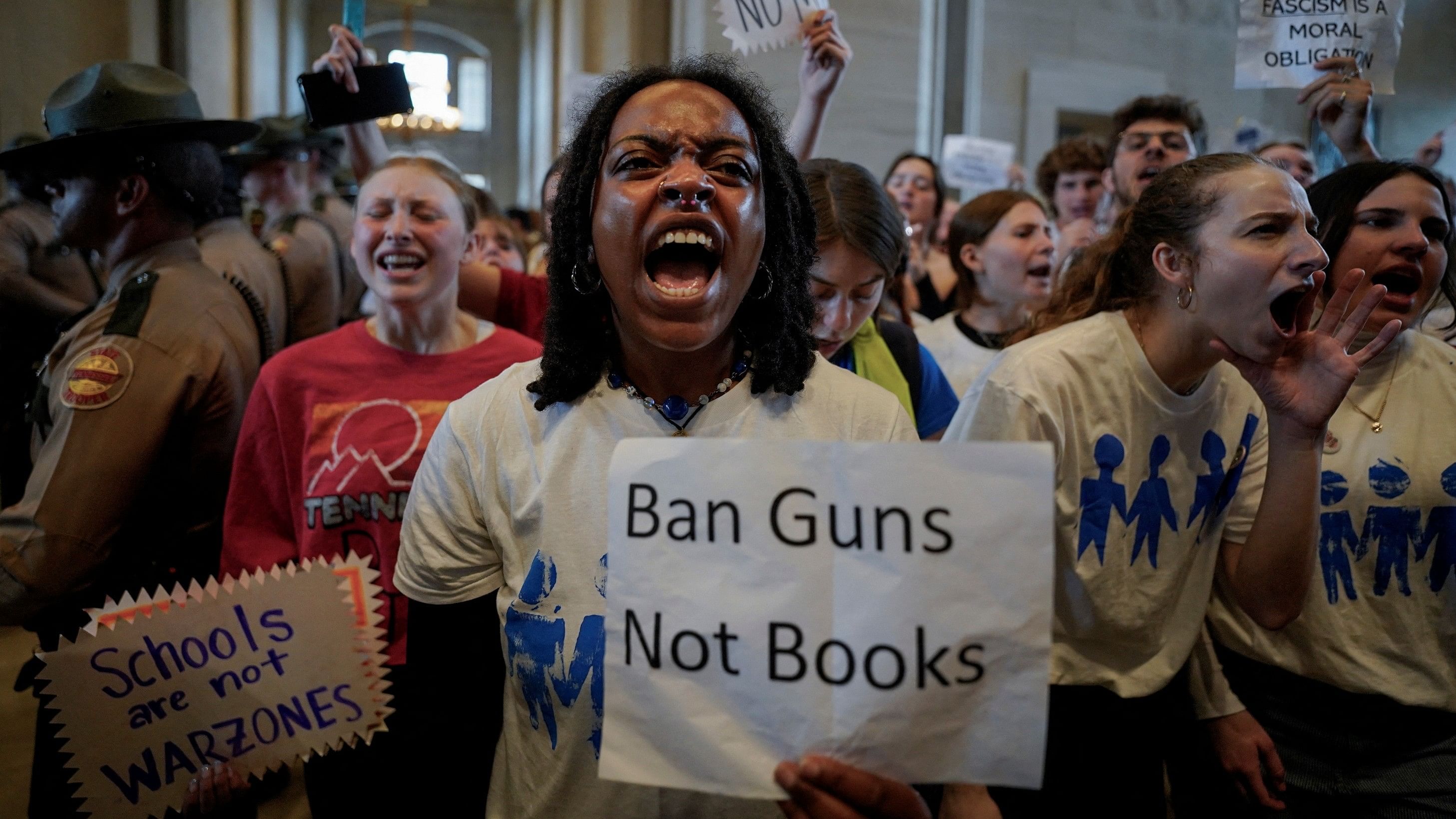 <div class="paragraphs"><p>Protesters gather as Republicans who control the Tennessee House of Representatives vote to expel Democratic members Justin Jones, Justin Pearson and Gloria Johnson for their role in a gun control demonstration at the statehouse the previous week, in Nashville, Tennessee, US, April 6, 2023.</p></div>