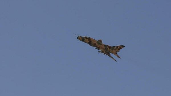 <div class="paragraphs"><p>A Houthi-operated fighter jet flies</p></div>