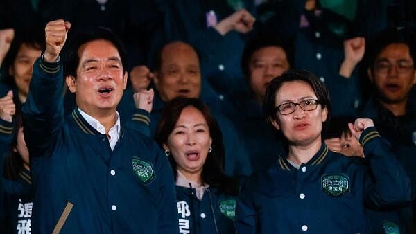 <div class="paragraphs"><p>Taiwan President-elect Lai Ching-te, of Democratic Progressive Party's (DPP) and his running mate Hsiao Bi-khim attend a rally following the victory in the presidential elections, in Taipei,</p></div>