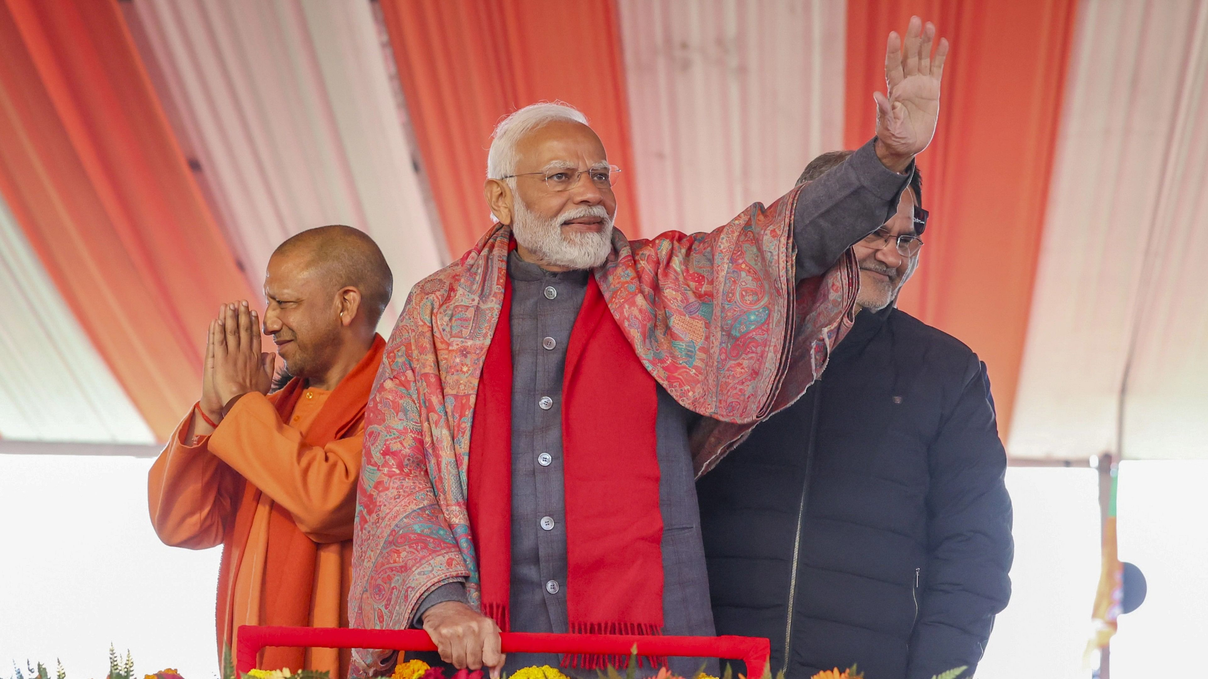<div class="paragraphs"><p>Prime Minister Narendra Modi with Uttar Pradesh Chief Minister Yogi Adityanath during the inauguration and foundation stone laying ceremony of various developmental projects, in Bulandshahr, Thursday, January 25, 2024.   </p></div>