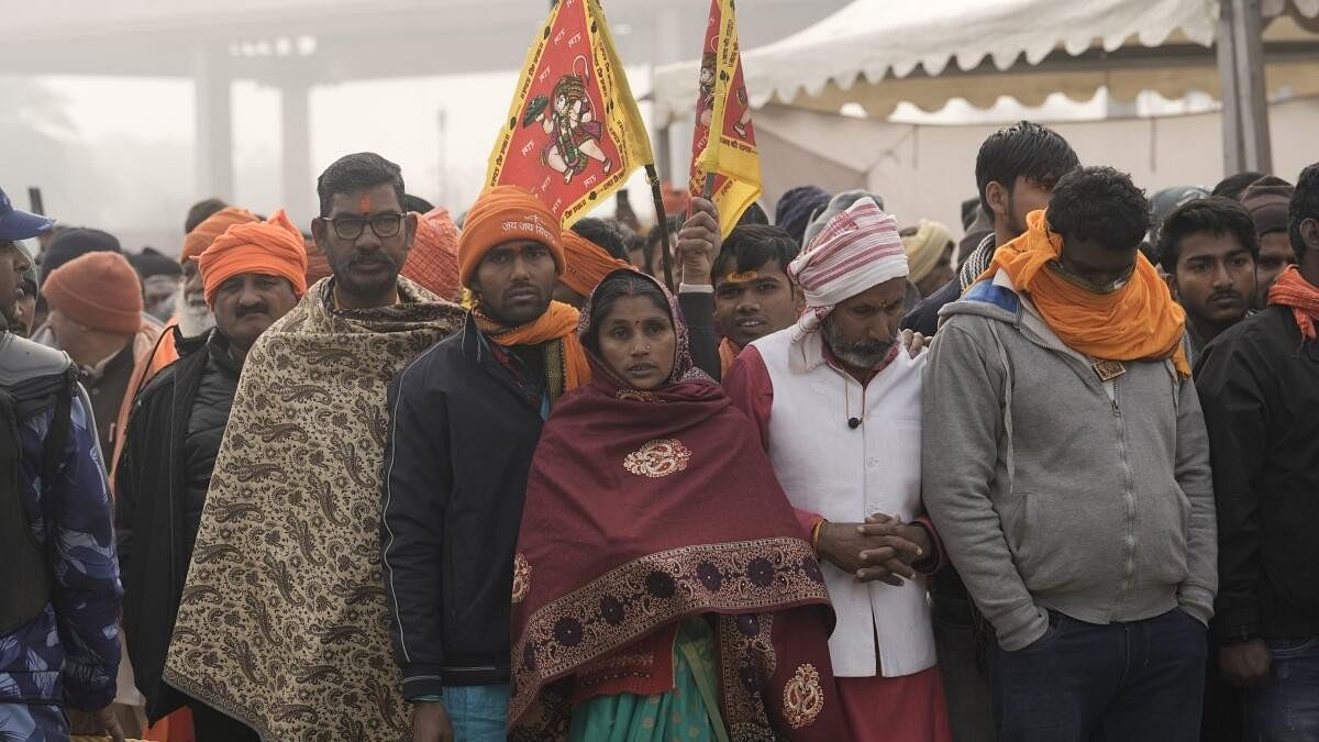 <div class="paragraphs"><p>Devotees wait in a queue to offer prayers at the Ram Mandir, in Ayodhya.</p></div>