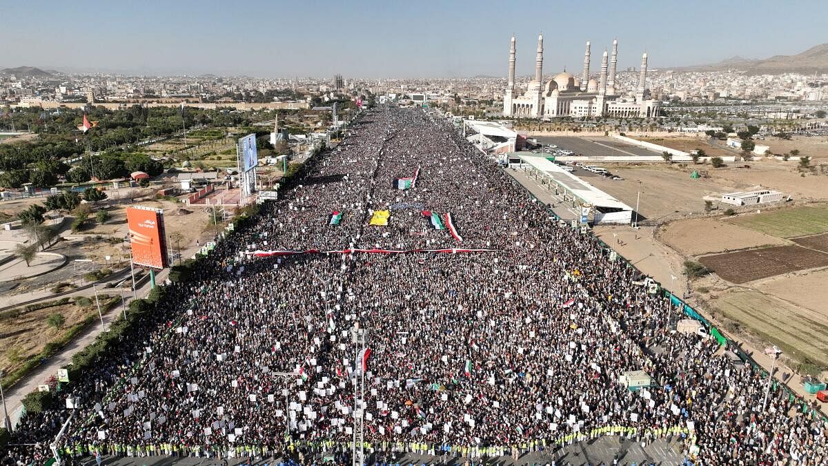 <div class="paragraphs"><p>A drone view as Houthi movement supporters rally to denounce air strikes launched by the US and Britain on Houthi targets in  Yemen.</p></div>