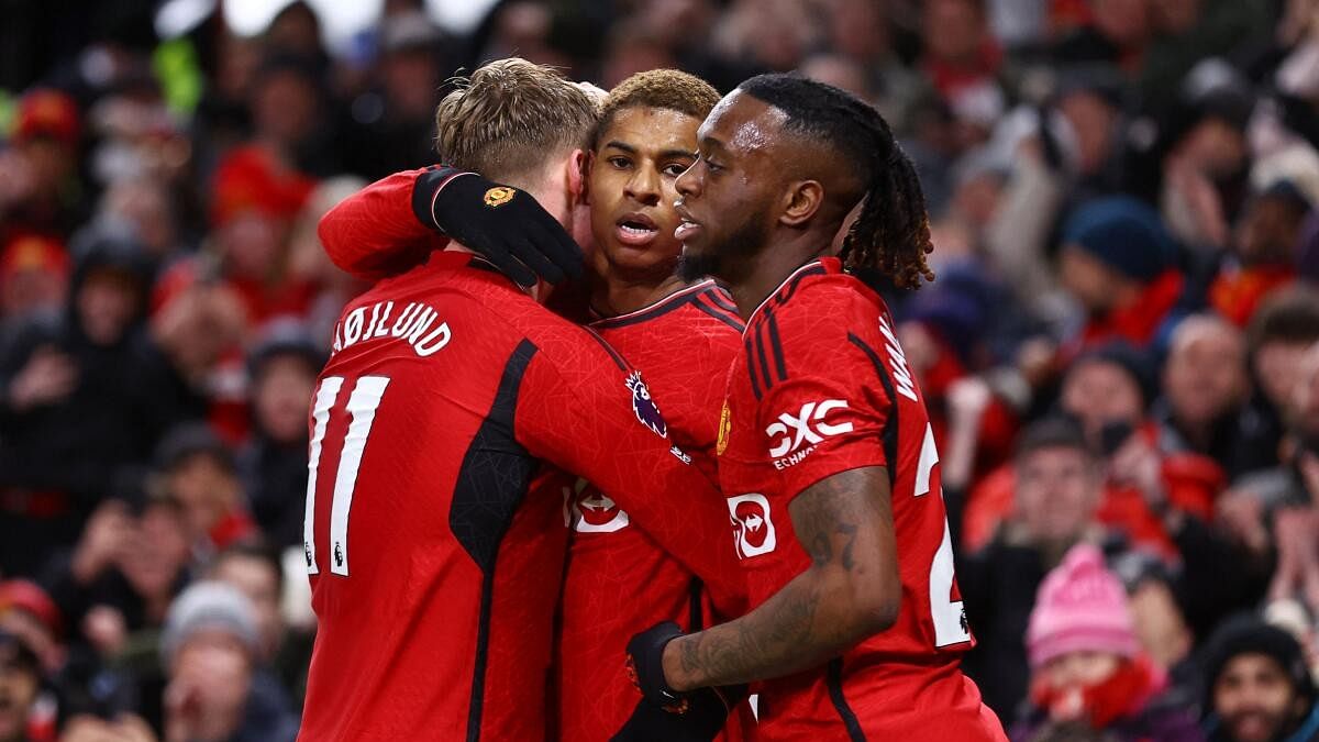 <div class="paragraphs"><p>Manchester United's Marcus Rashford celebrates scoring their second goal with Rasmus Hojlund and Aaron Wan-Bissaka</p></div>