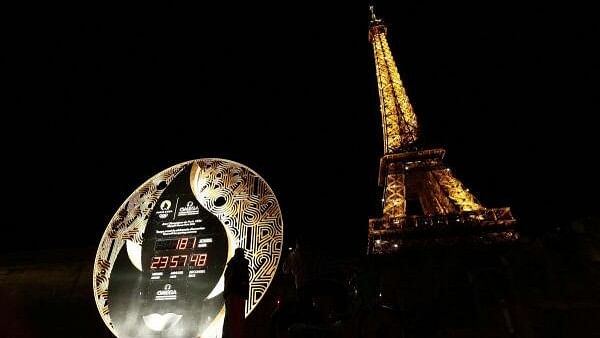 <div class="paragraphs"><p>With six months to go until the start of the Paris 2024 Olympics the countdown clock is pictured near the Eiffel Tower.</p></div>