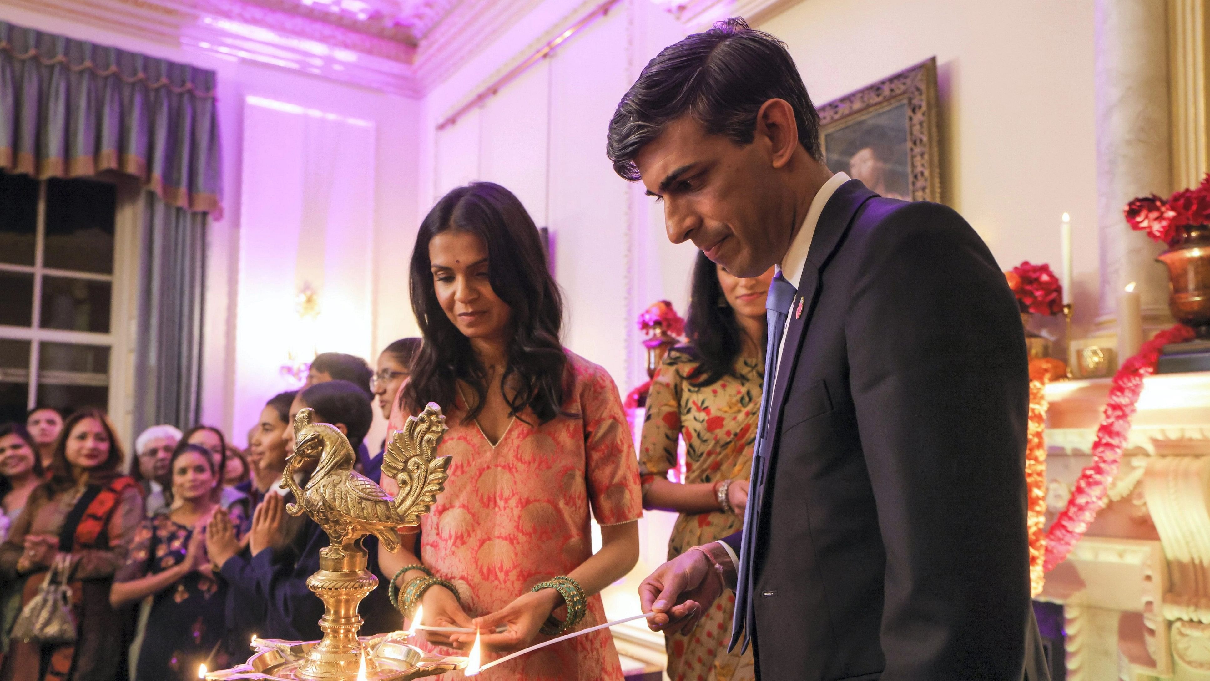 <div class="paragraphs"><p>UK Prime Minister Rishi Sunak with wife Akshata Murty during an event at 10, Downing Street.</p></div>