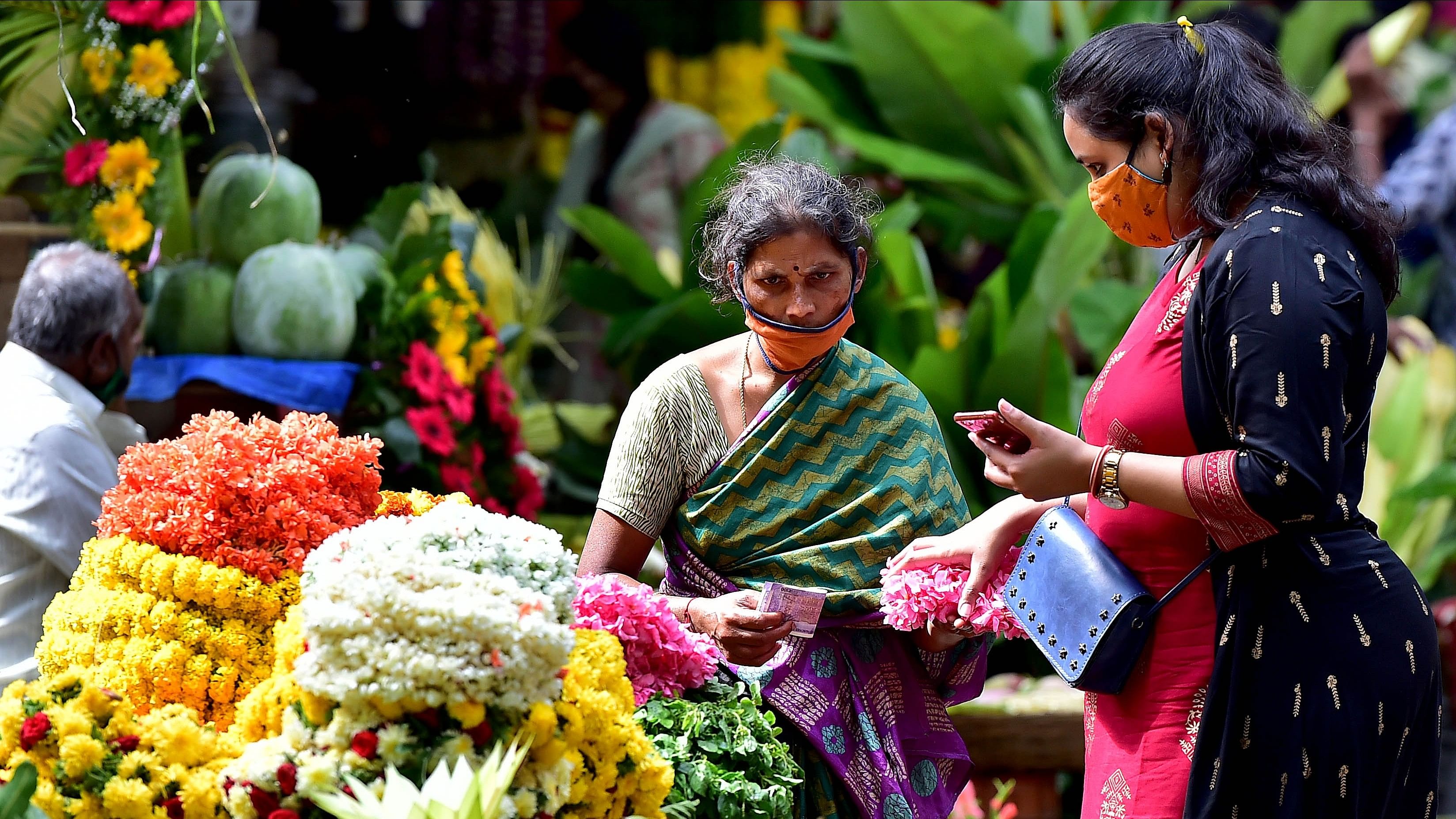 <div class="paragraphs"><p>Vendors like her at the Malleswaram market&nbsp;grapple with dwindling incomes and dire conditions in their temporary shelters.</p></div>