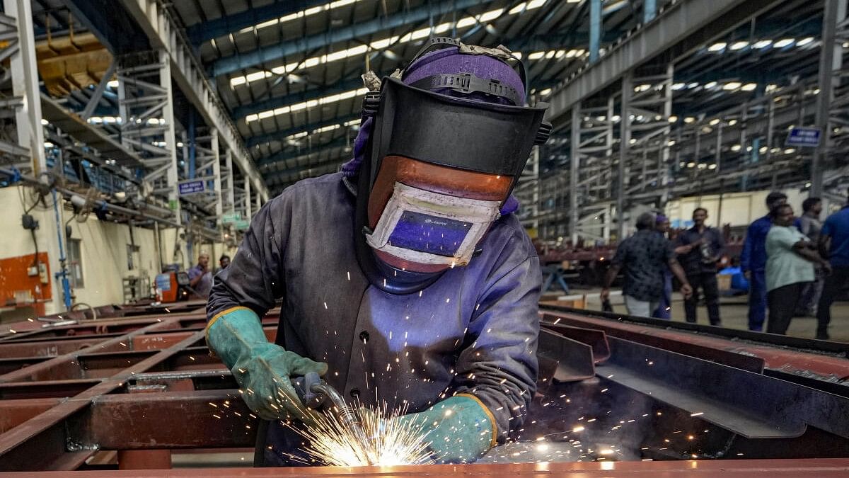 <div class="paragraphs"><p>Representative image of a person working in a factory.</p></div>