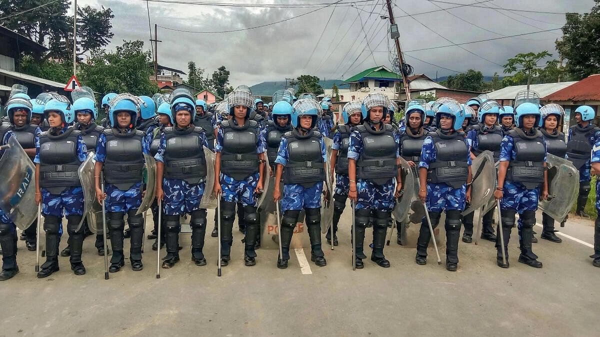 <div class="paragraphs"><p>Security personnel stand guard in Manipur.</p></div>