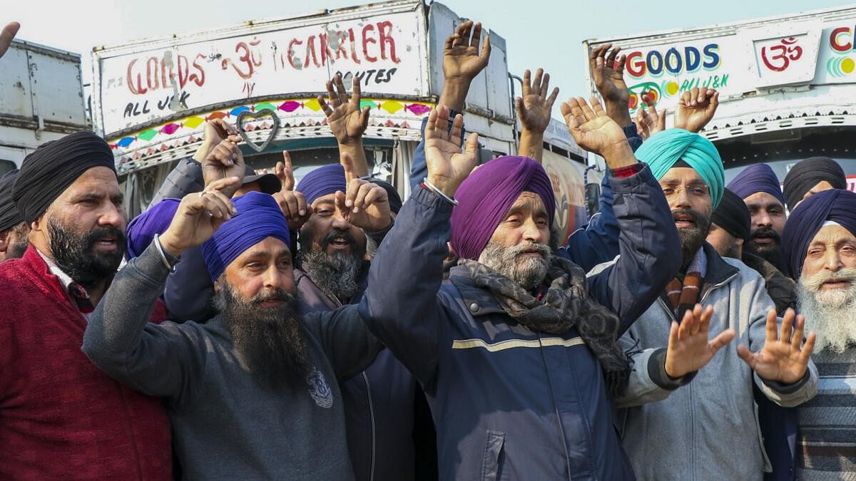 <div class="paragraphs"><p>Members of the All Jammu and Kashmir Oil Tankers Association raise slogans during a protest.&nbsp;</p></div>
