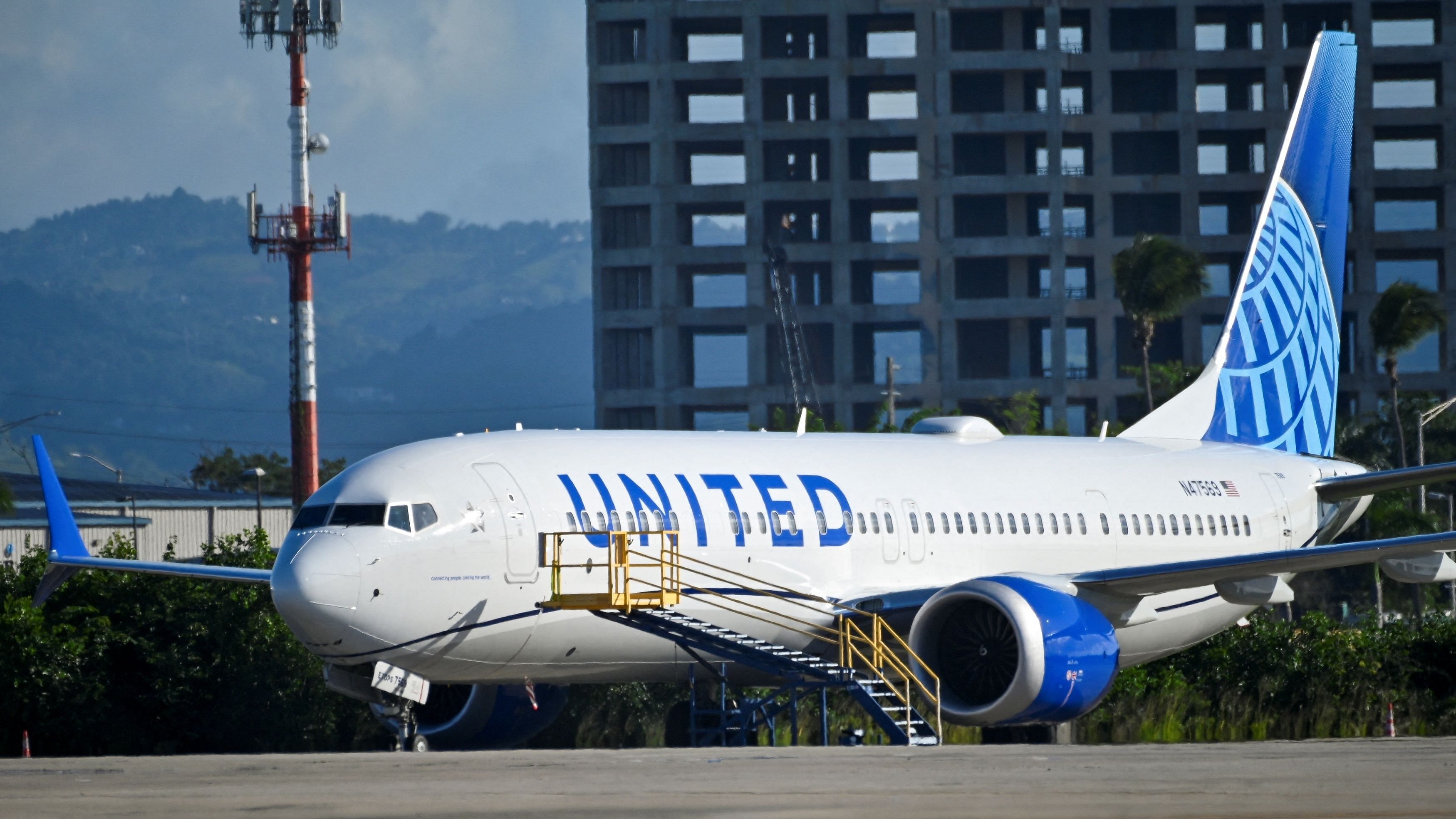 <div class="paragraphs"><p>A United Airlines Boeing 737 MAX 9 jetliner is grounded, as passengers try to rebook their tickets from cancelled United Airlines flights after U.S. air safety regulator the Federal Aviation Administration  grounded 171 Boeing 737 MAX 9 jetliners for safety checks because of the emergency landing of an Alaska Airlines plane, at Luis Munoz Marin International Airport in San Juan, Puerto Rico.</p></div>