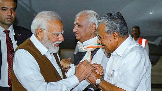 <div class="paragraphs"><p>Prime Minister Narendra Modi being welcomed by Kerala Governor Arif Mohammed Khan and Chief Minister Pinarayi Vijayan upon his arrival at Cochin International Airport, in Kochi, Tuesday, January 16, 2024.</p></div>