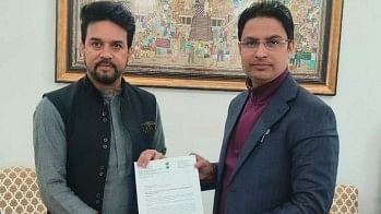 <div class="paragraphs"><p>Anurag Thakur and Raju Bista.</p></div>