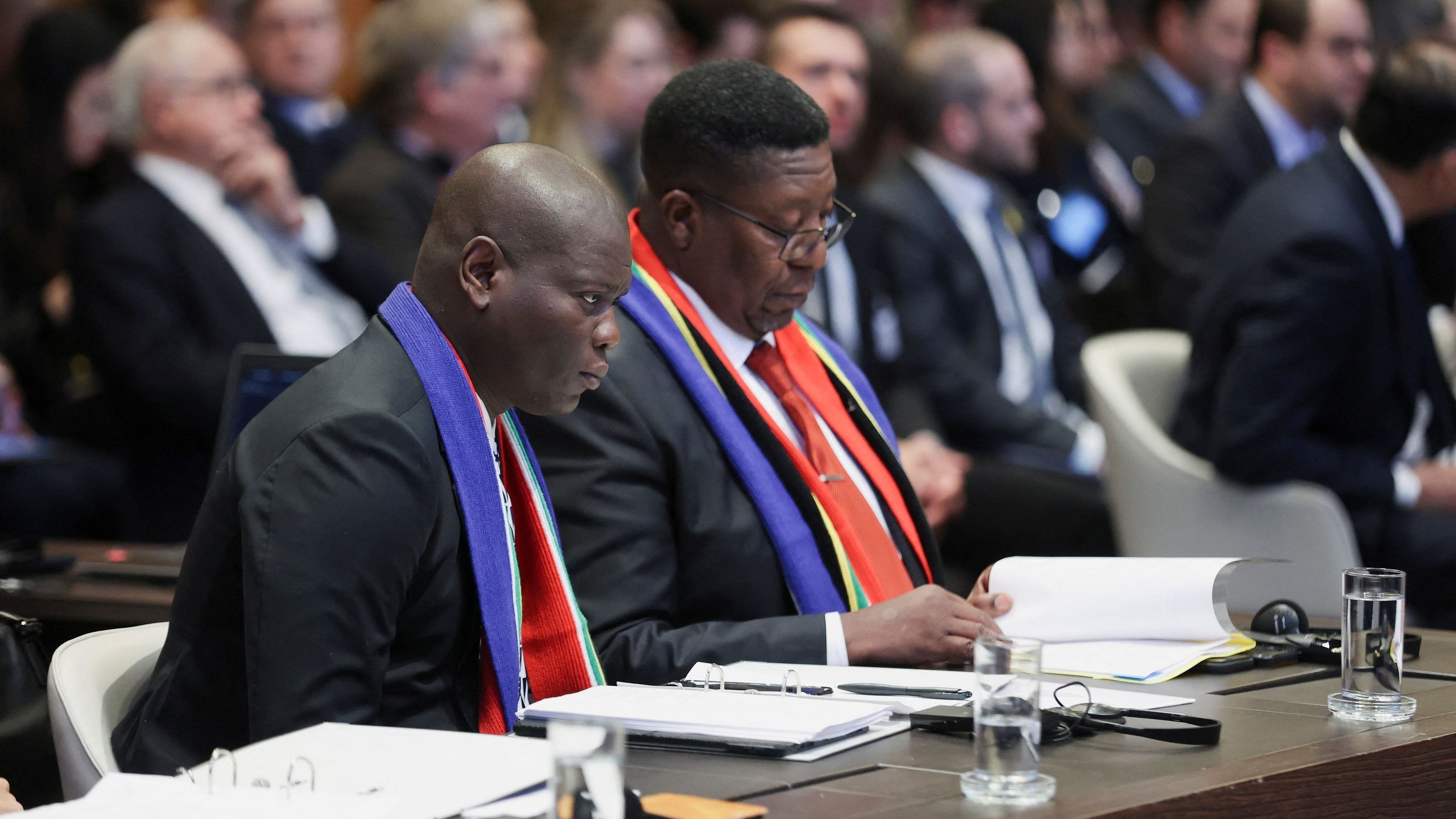 <div class="paragraphs"><p>South Africa's Minister of Justice Ronald Lamola and South African Ambassador to the Netherlands Vusimuzi Madonsela sit as judges at the International Court of Justice  hear a request for emergency measures by South Africa, who asked the court to order Israel to stop its military actions in Gaza.</p></div>