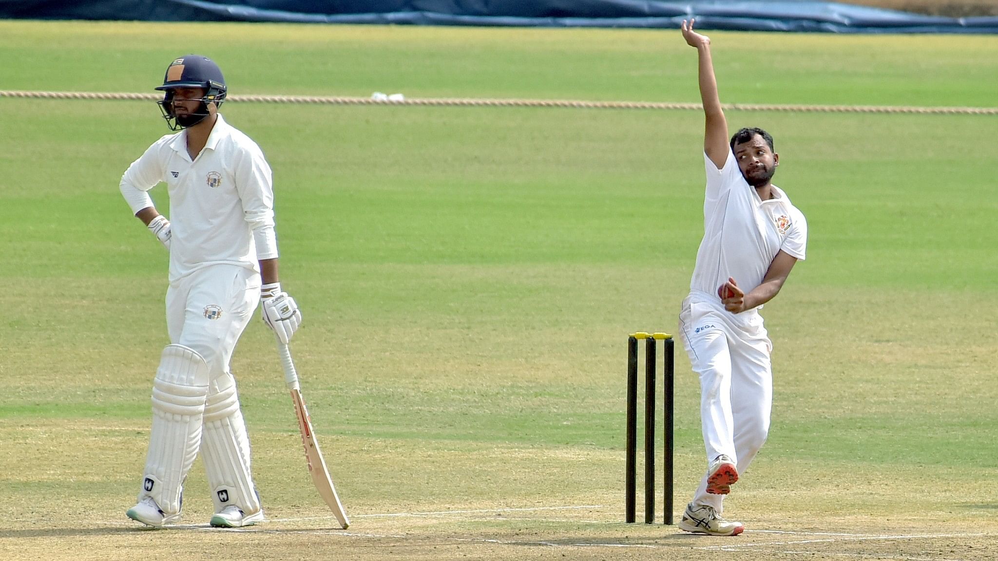 <div class="paragraphs"><p>Rohit Kumar (right) grabbed three wickets in the second innings to help put Karnataka in a winning position against Punjab in their Ranji Trophy match in Hubballi on Monday.</p></div>