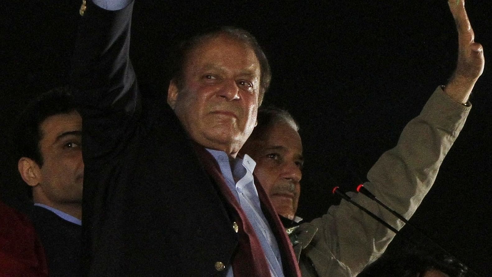 <div class="paragraphs"><p>Pakistan's former Prime Minister Nawaz Sharif gestures to supporters, ahead of the 2024 Pakistani general election. </p></div>