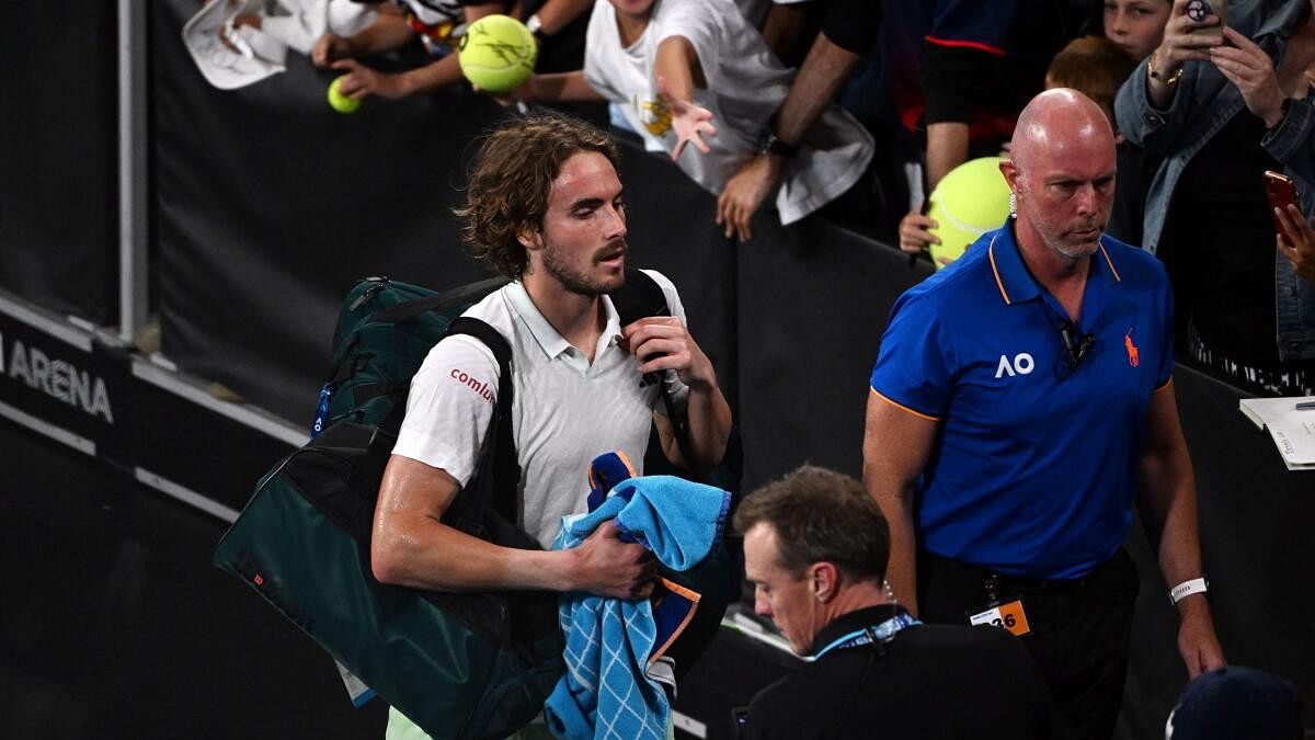 <div class="paragraphs"><p>Greece’s Stefanos Tsitsipas walks off the court after losing his fourth round match against Taylor Fritz of the US.</p></div>