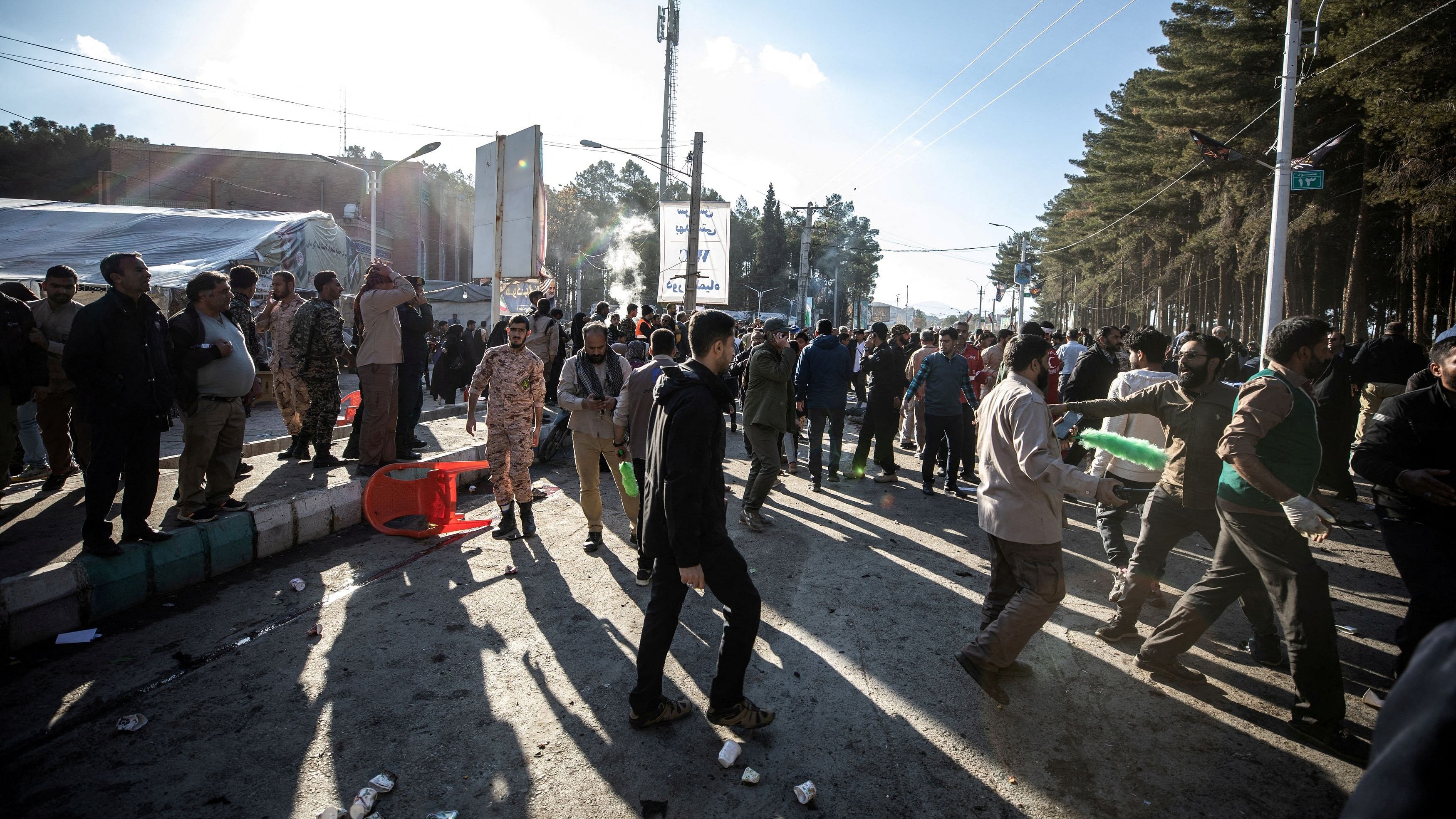 <div class="paragraphs"><p>People gather at the scene of explosions during a ceremony held to mark the death of late Iranian General Qassem Soleimani, in Kerman, Iran, January 3, 2024. </p></div>