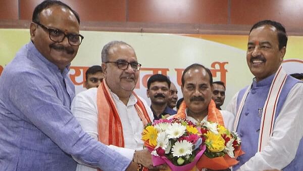 <div class="paragraphs"><p>File photo of Dara Singh Chauhan joining the BJP in July 2023 in the presence of Deputy Chief Ministers Keshav Prasad Maurya and Brajesh Pathak and UP BJP chief Bhupendra Singh Chaudhary.</p></div>