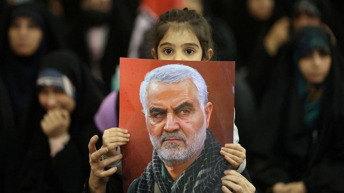 <div class="paragraphs"><p>An Iranian girl holds a picture of Qassem Soleimani, during a ceremony to mark the fourth anniversary of the killing of senior Iranian military commander General Qassem Soleimani in a U.S. attack, in Tehran, Iran, January 3, 2024.</p></div>