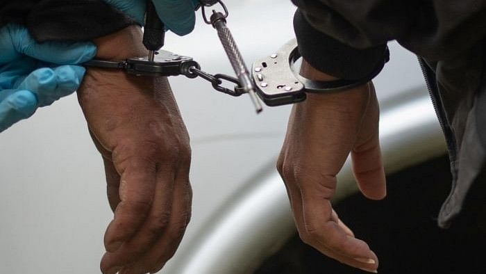 <div class="paragraphs"><p>Representative image of criminals in handcuffs.</p></div>