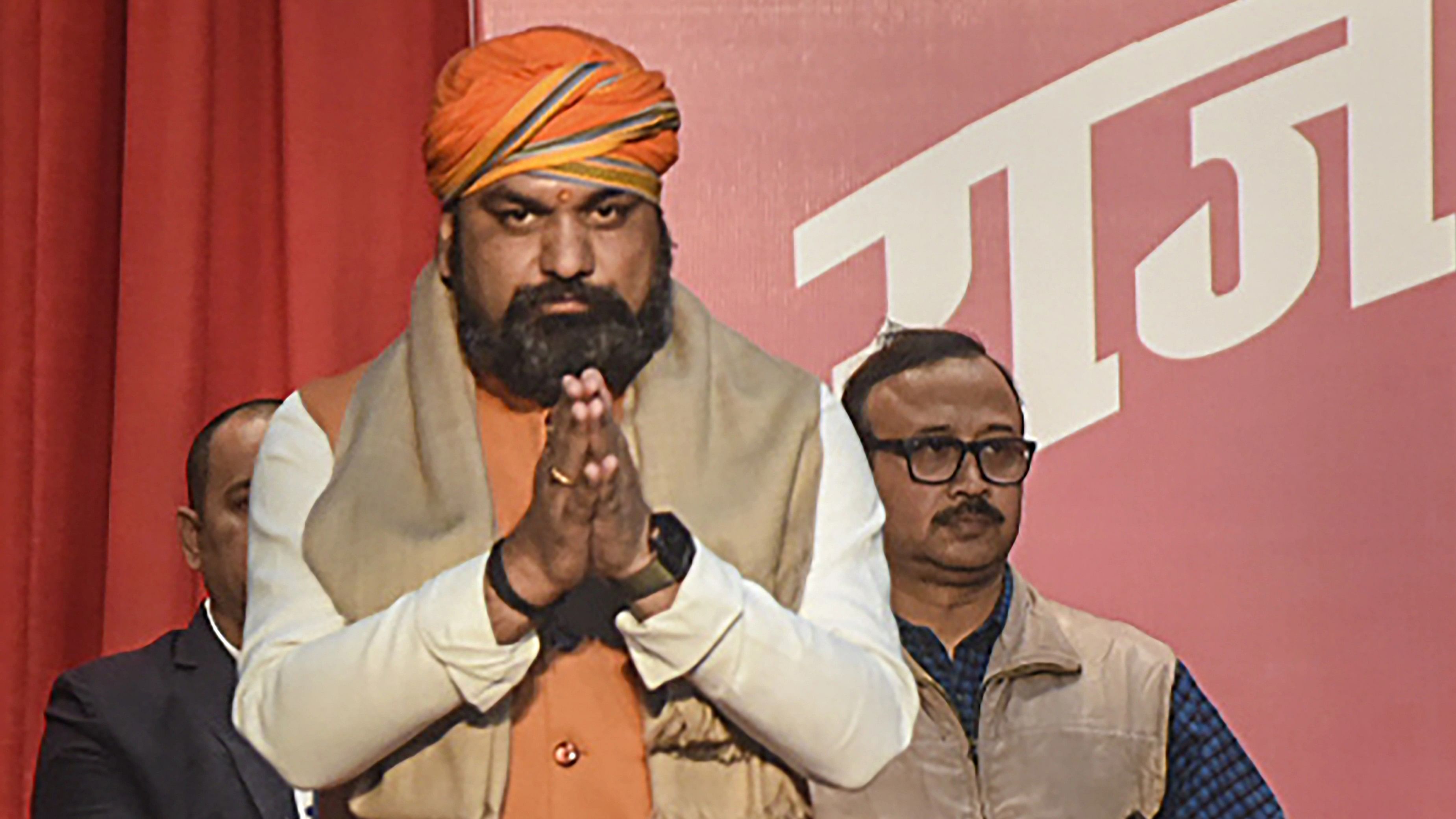 <div class="paragraphs"><p>Patna: BJP leader Samrat Choudhary greets after taking oath as Bihar Deputy Chief Minister during the swearing-in ceremony of new state government, at Raj Bhavan in Patna</p></div>