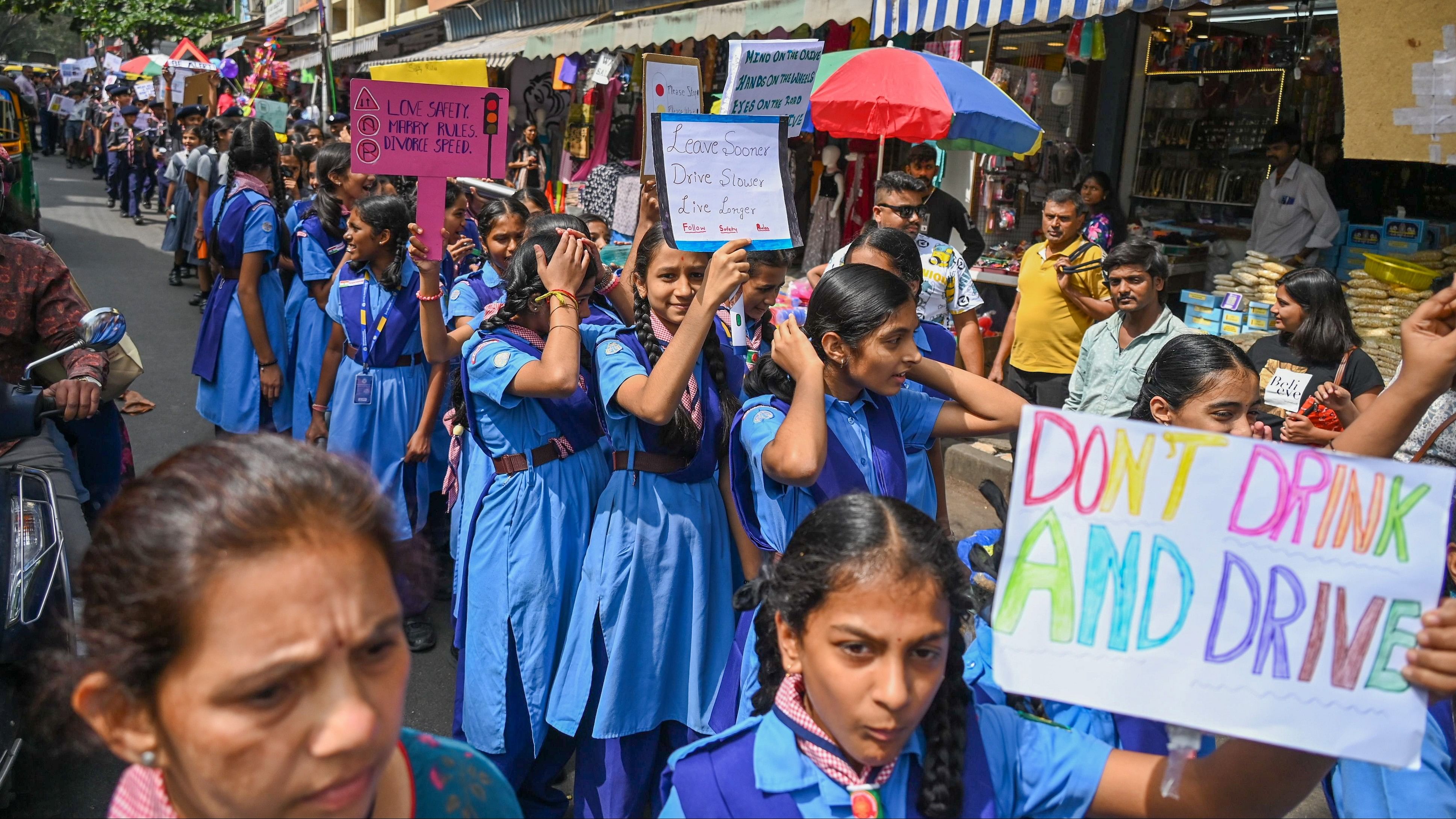 <div class="paragraphs"><p>Students take part in an awareness rally on road safety as part of the Road Safety Month organised by the Bengaluru City Police in Malleswaram on Saturday.&nbsp;</p></div>