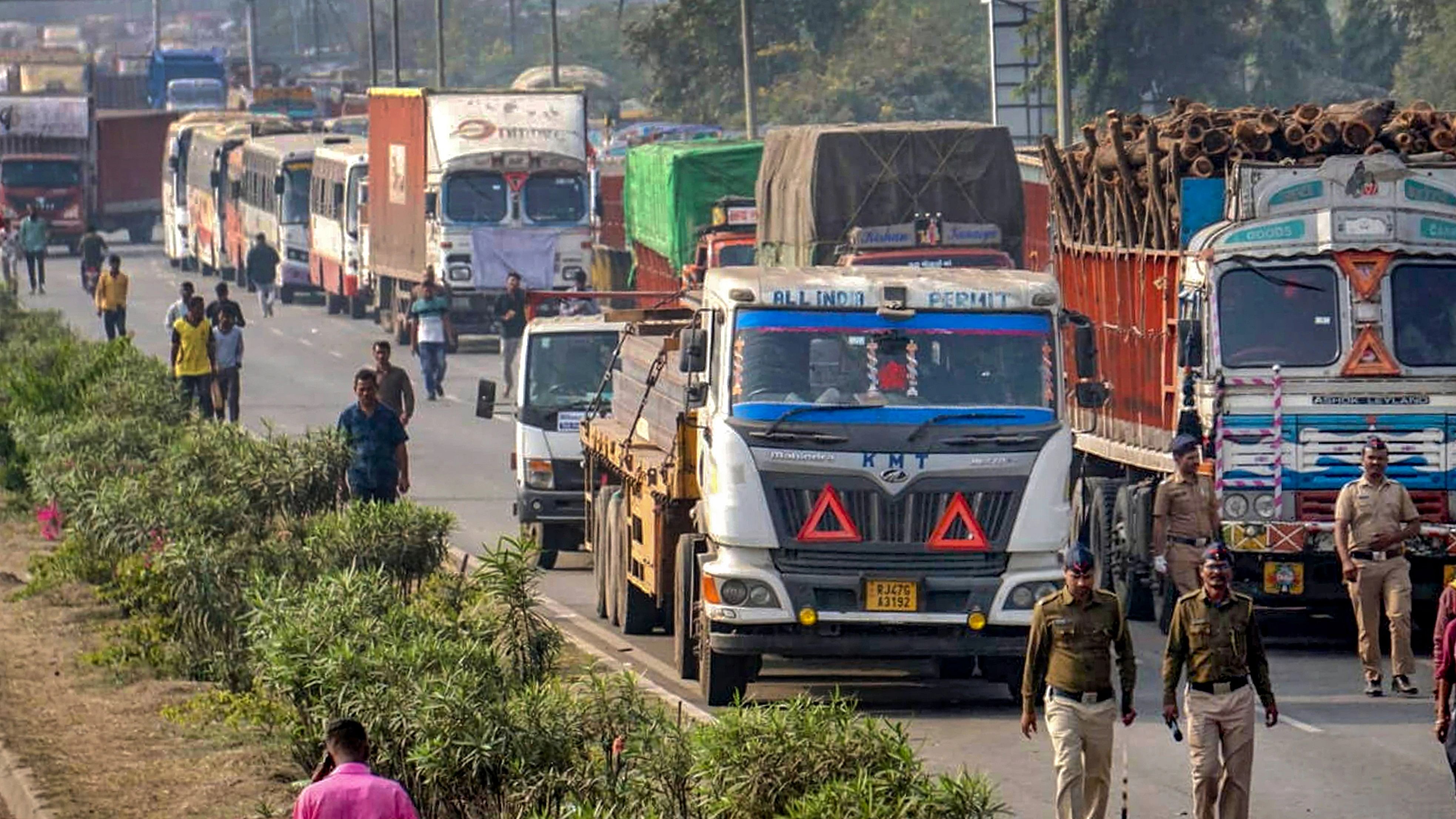 <div class="paragraphs"><p>Trucks are parked on a highway amid 'rasta roko' protest by truck drivers, in Nagpur, Tuesday, Jan. 2, 2024.</p></div>
