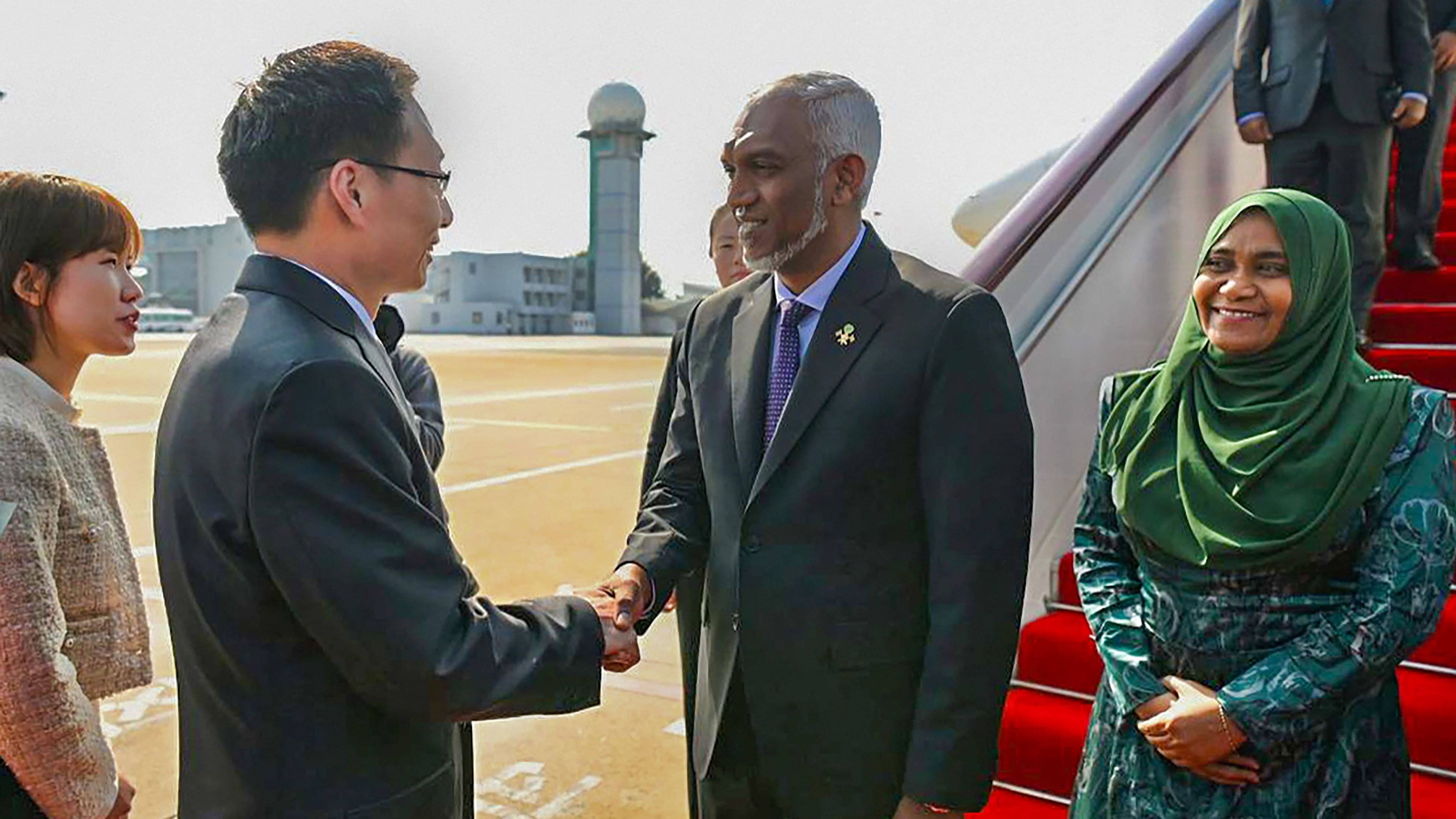 <div class="paragraphs"><p>Maldives President Mohamed Muizzu and First Lady Sajidha Mohamed being welcomed upon their arrival in People’s Republic of China, on Monday, Jan. 8, 2024. </p></div>