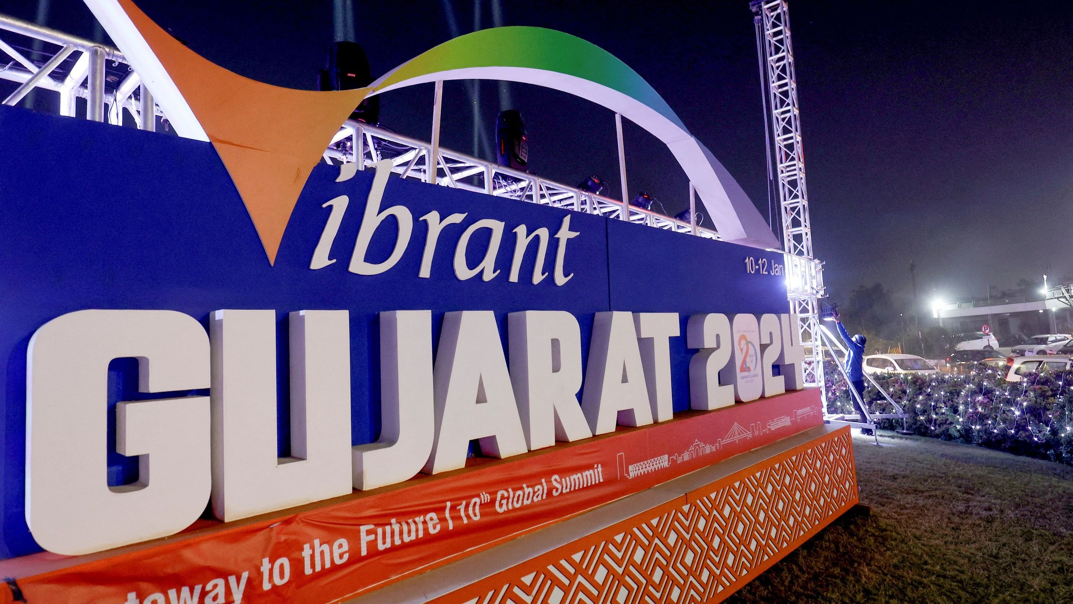 <div class="paragraphs"><p>A worker installs lights ahead of the Vibrant Gujarat Global Summit, in Ahmedabad, India, January 4, 2024. </p></div>