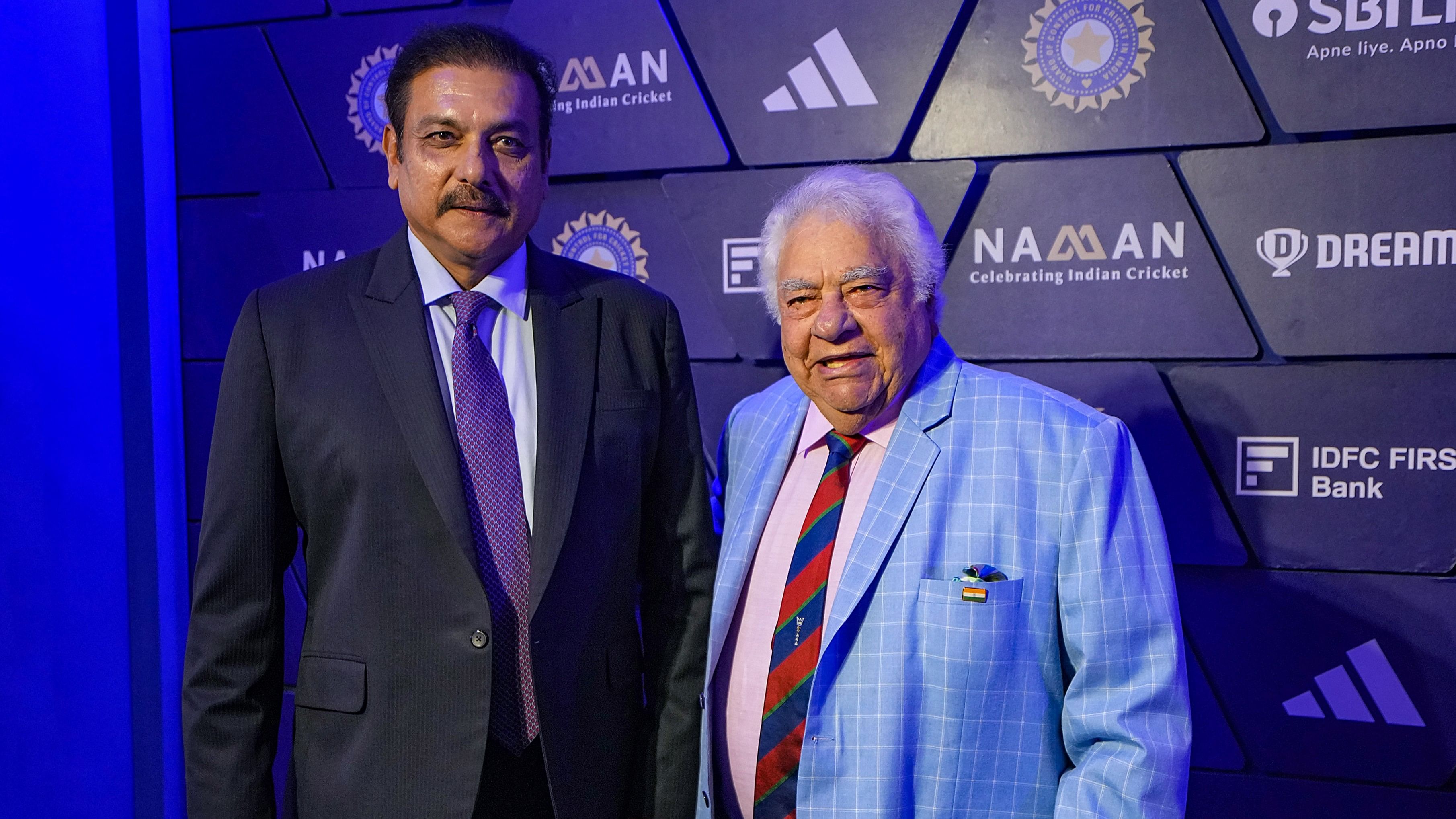 <div class="paragraphs"><p>Ravi Shastri (left) and Farokh Engineer strike a happy pose at the BCCI Annual Awards night in Hyderabad.</p></div>