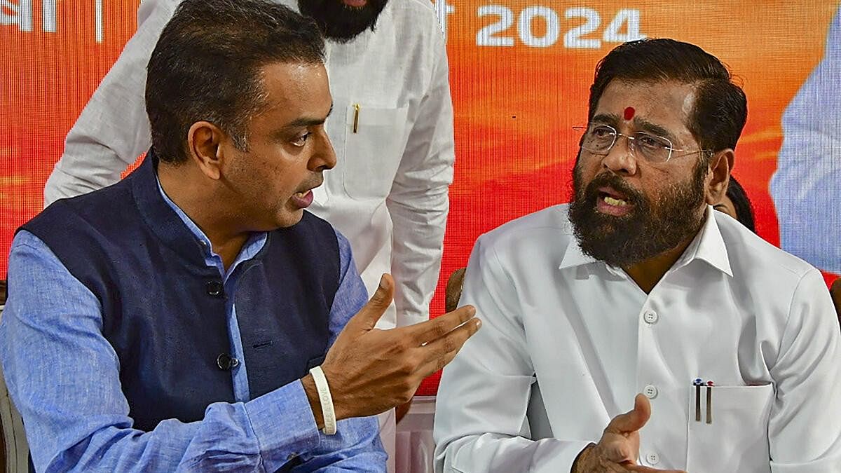 <div class="paragraphs"><p>Maharashtra Chief Minister Eknath Shinde with former Congress leader Milind Deora as the latter joined Shiv Sena (Shinde faction), in Mumbai.</p></div>