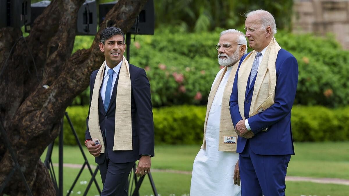 <div class="paragraphs"><p>Prime Minister Narendra Modi with US President Joe Biden and United Kingdom Prime Minister Rishi Sunak</p></div>