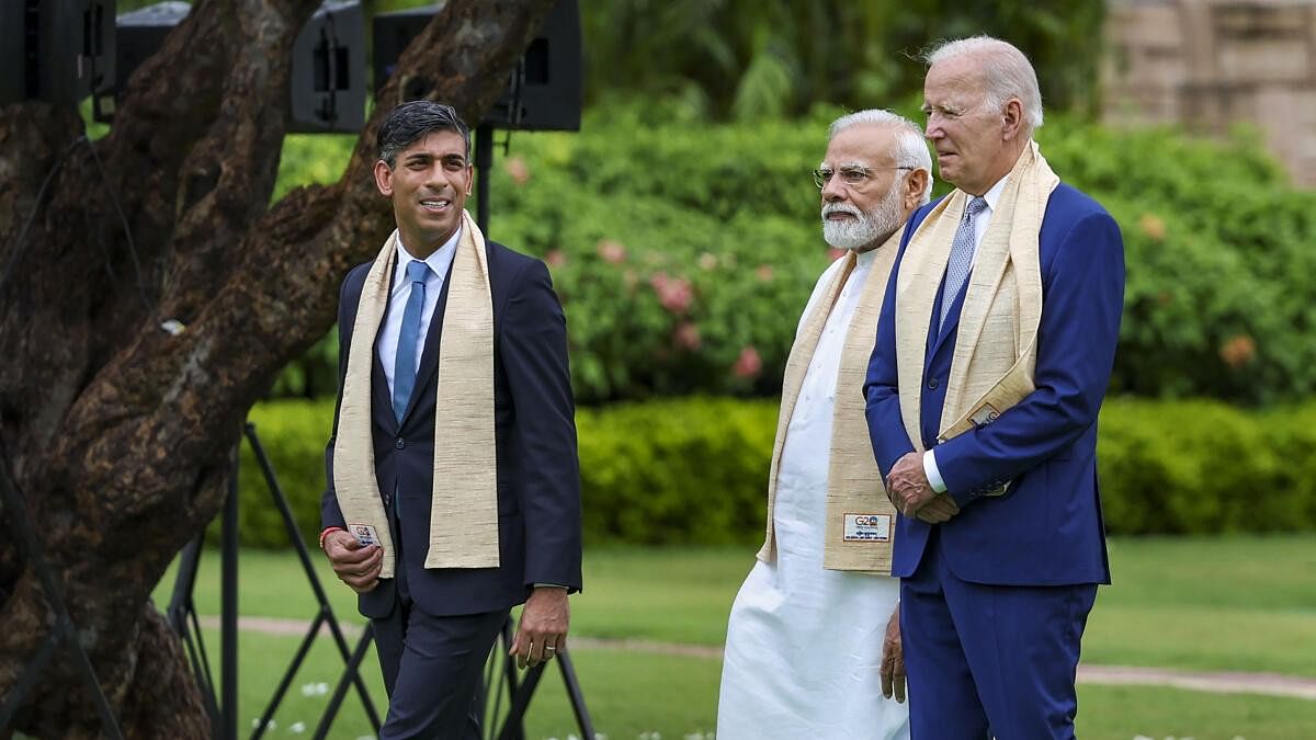 <div class="paragraphs"><p>File Photo: Prime Minister Narendra Modi with US President Joe Biden and United Kingdom Prime Minister Rishi Sunak.</p></div>